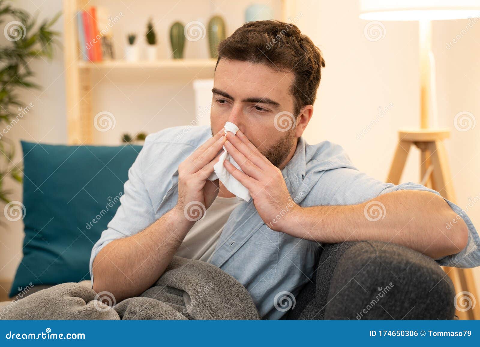 man portrait suffering cold and flu at home