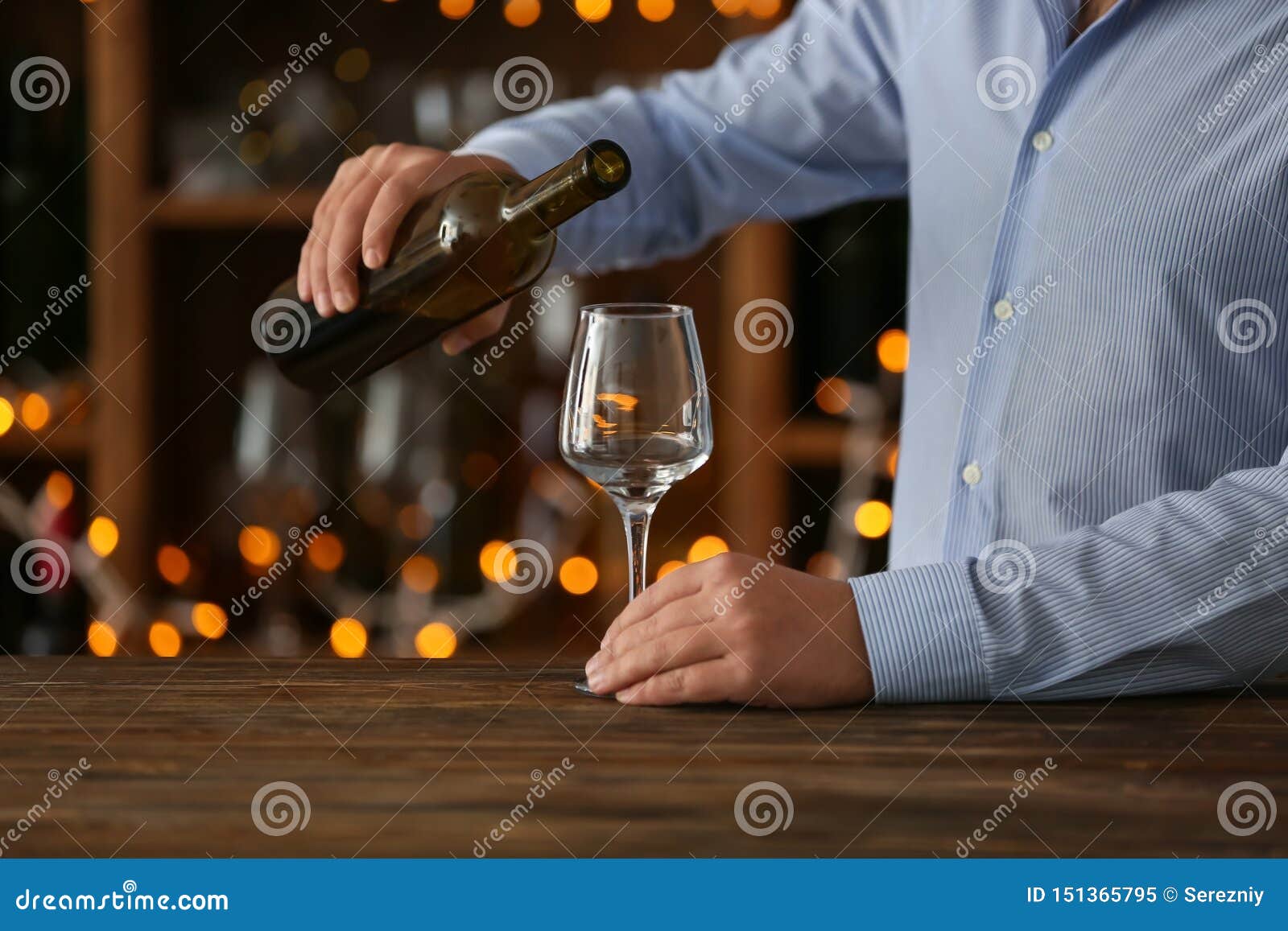 Man Pouring Wine into Glass in Bar Stock Image Image of celebration