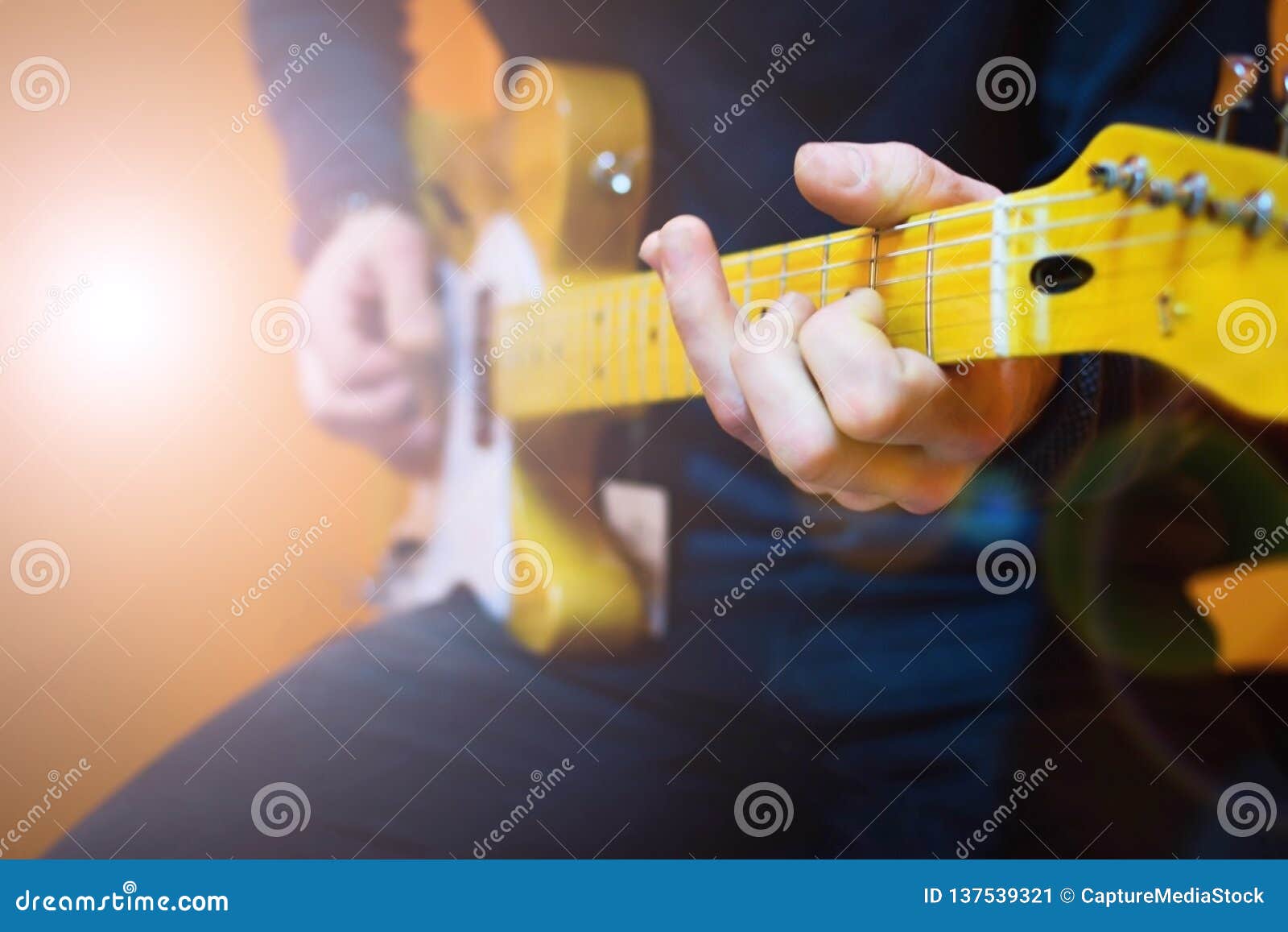 Man Practicing Electric Guitar Playing. Guitar Lesson Stock Image