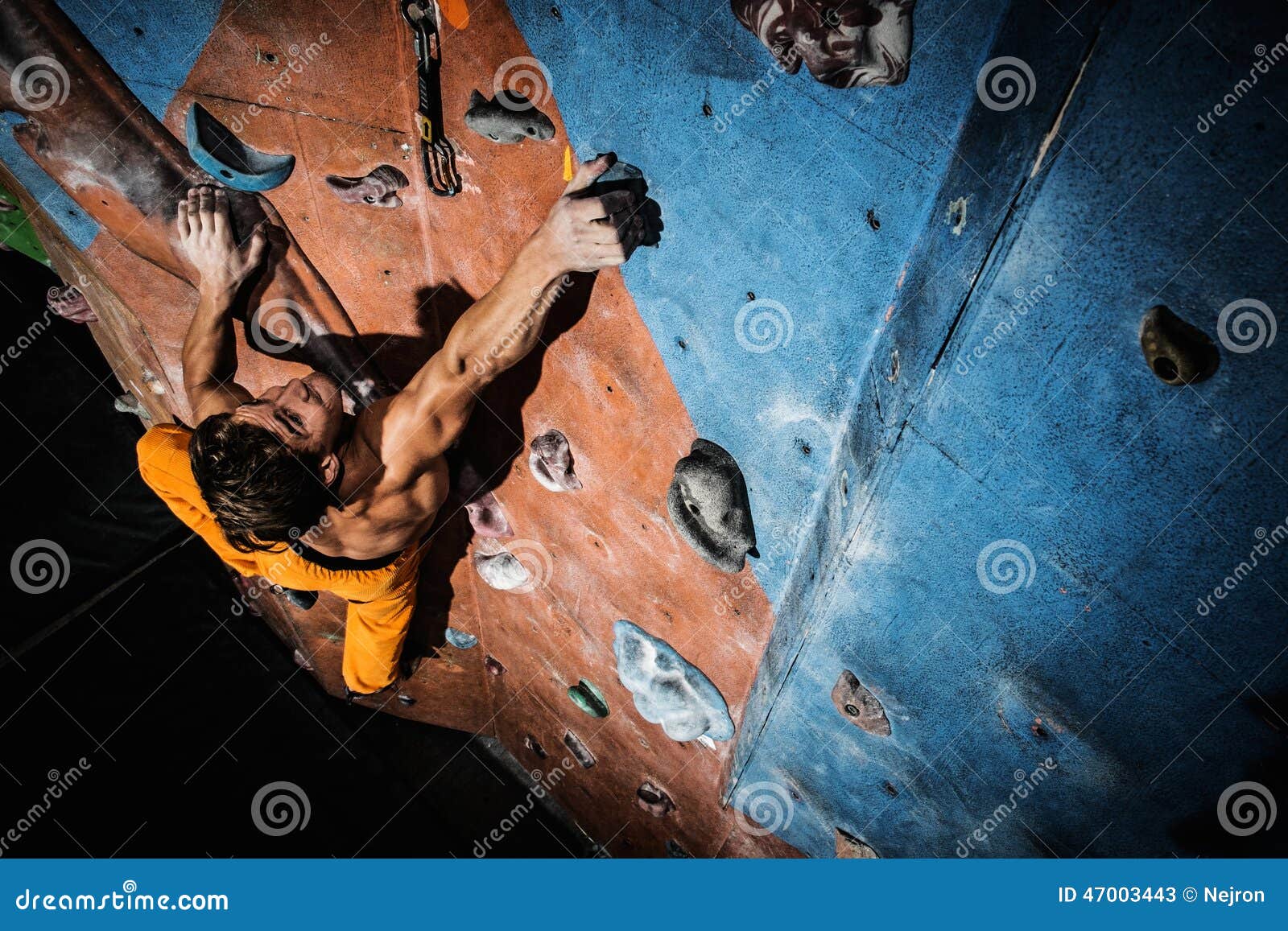 Man Practicing Rockclimbing on a Rock Wall Stock Image Image of