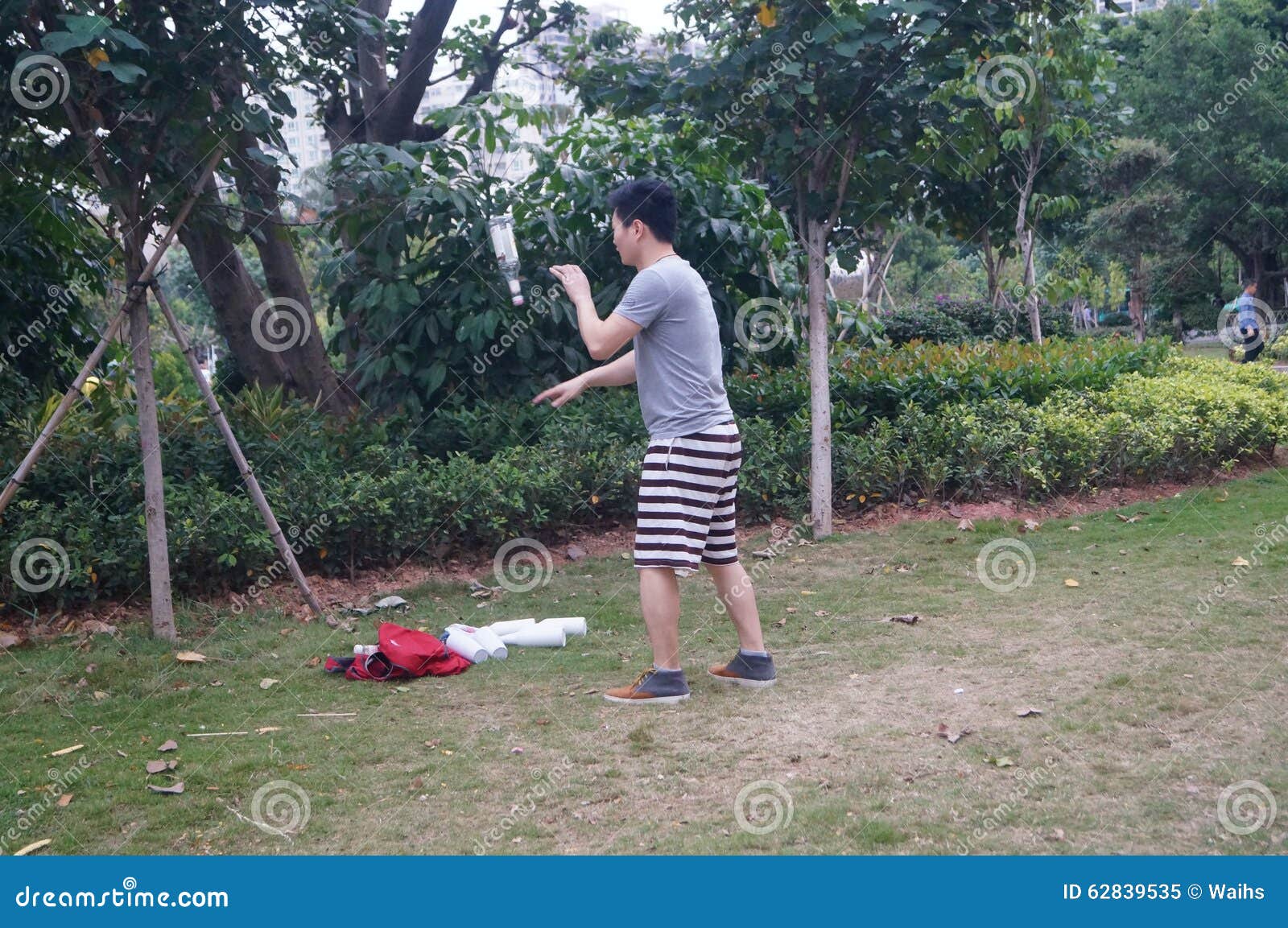 Man Practicing Throwing Bottles Editorial Image Image of people