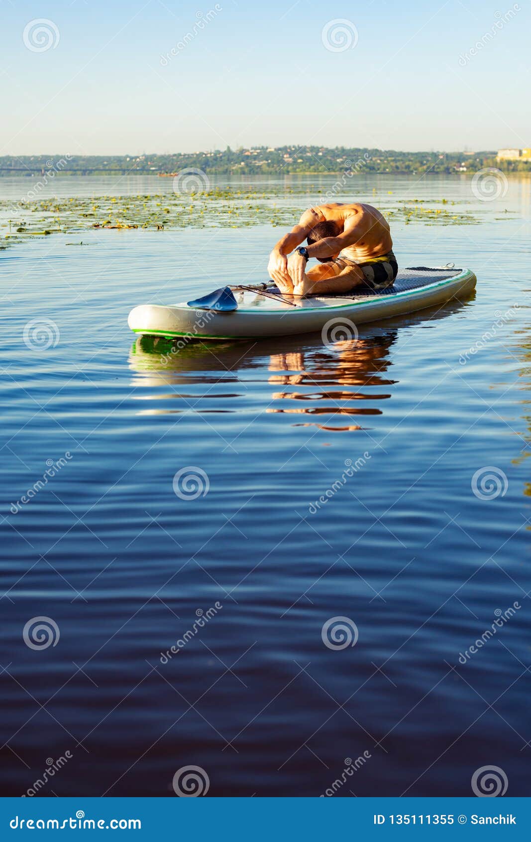 Man Practicing Yoga on a SUP Board Stock Image - Image of exercise ...