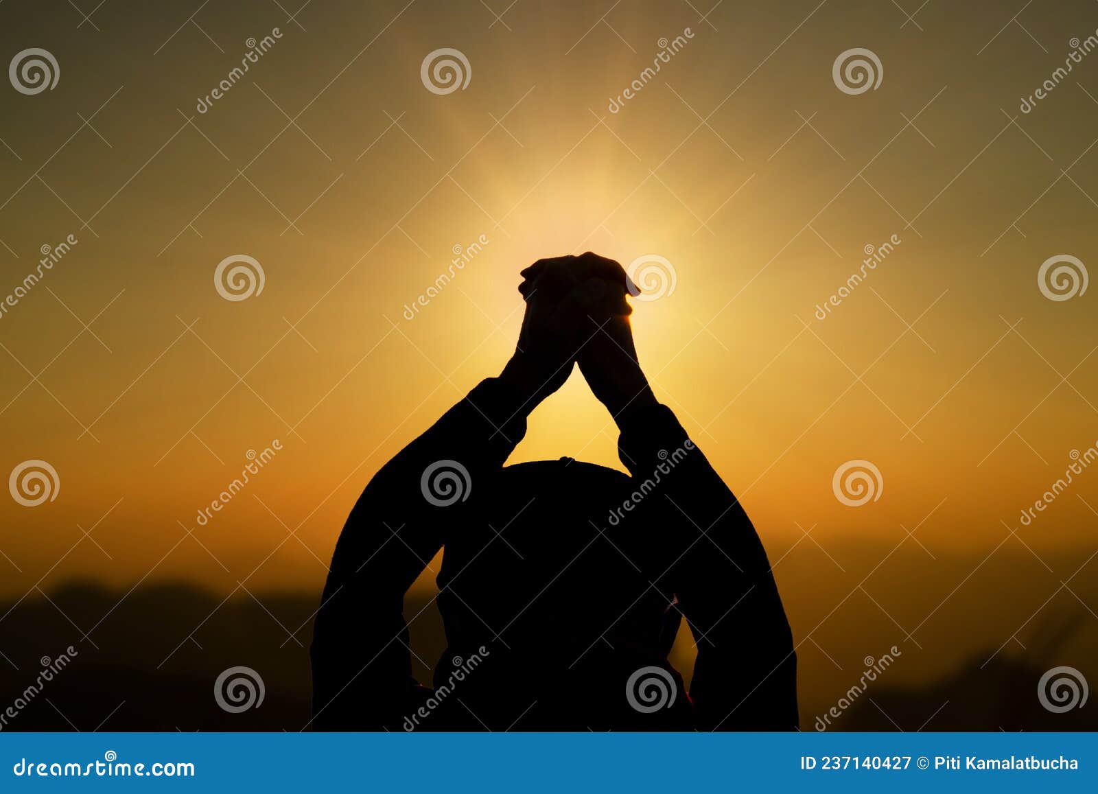 Man Praying Meditating In Harmony And Peace At Sunset Religion