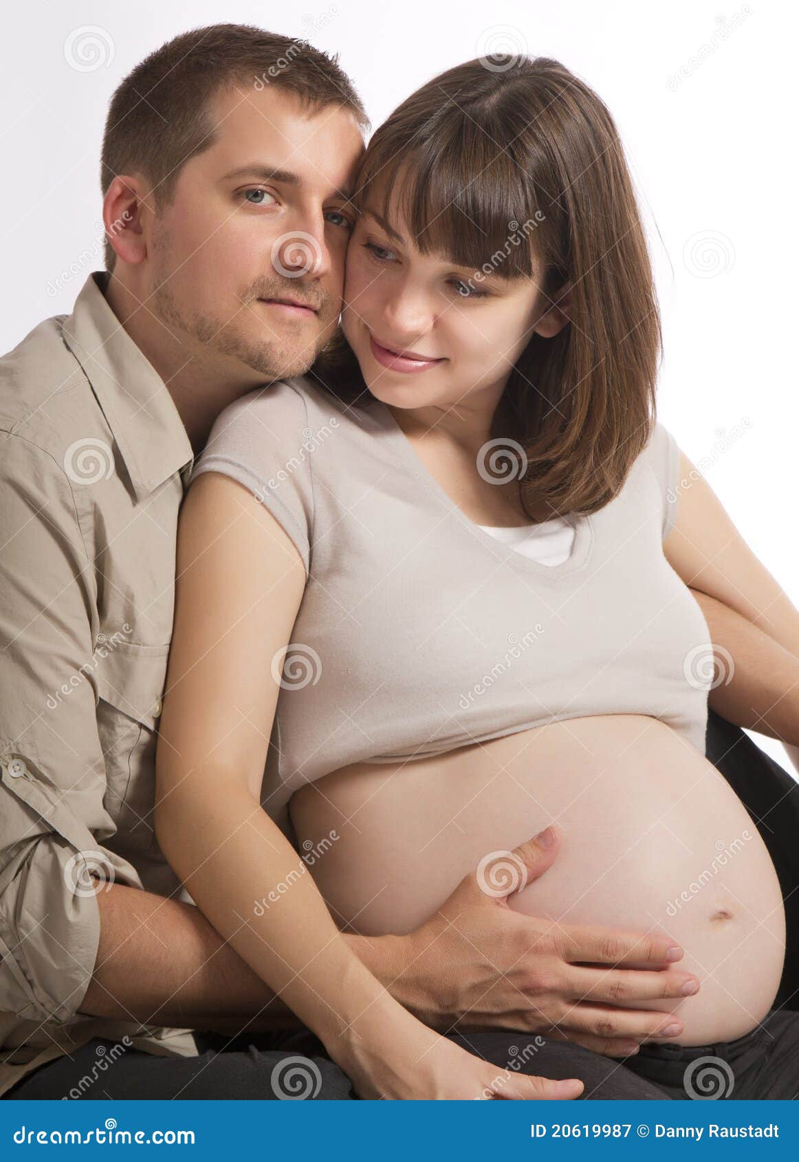 Man and pregnant wife stock image photo