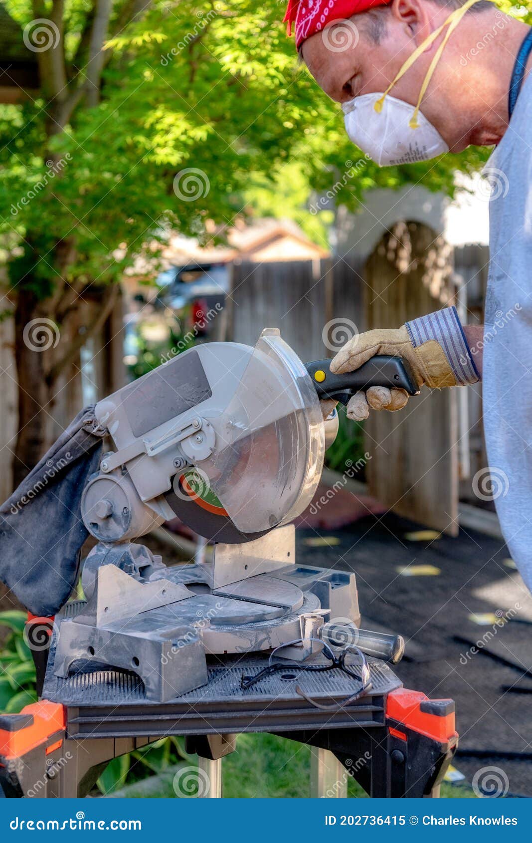 Man Prepares a Chop Saw for Cutting Masonry Stock Image Image of