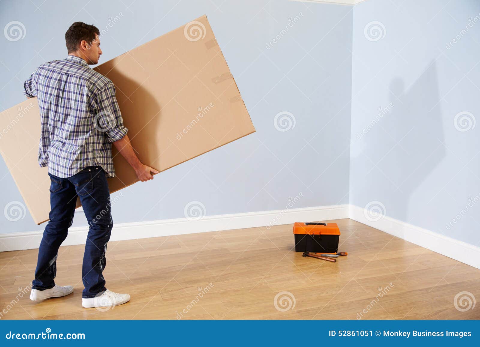 man preparing to assemble flat pack furniture