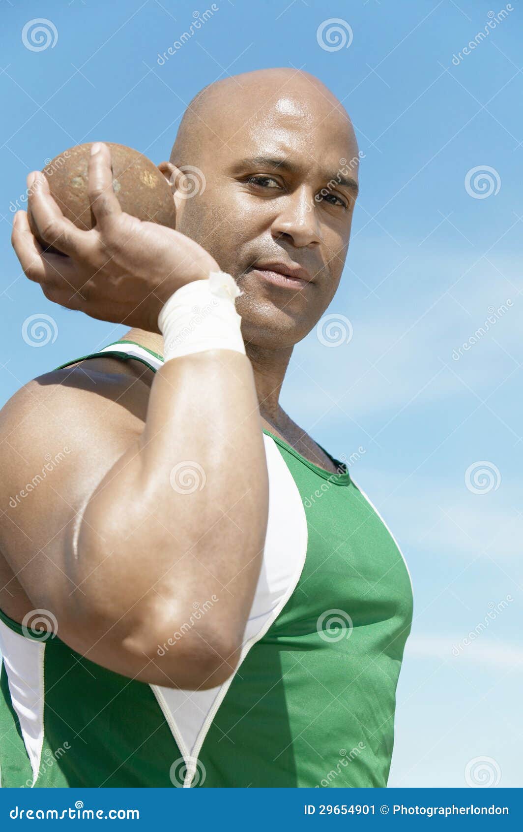 Man Preparing To Toss Shot Put Stock Image Image of outdoors, event 29654901