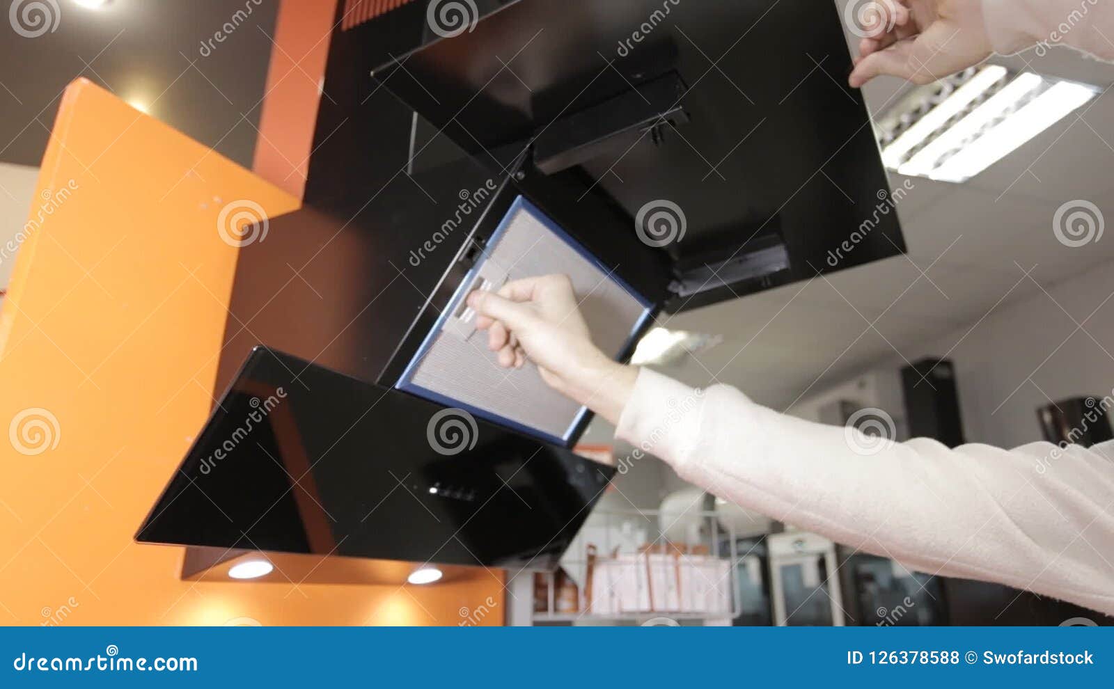 The Man Presses the Buttons on the Control Panel of the New Modern