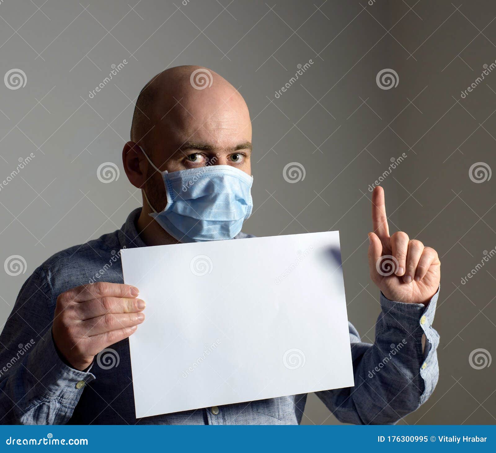 Download Man In Protective Face Mask With White Blank Sheet Poster ...