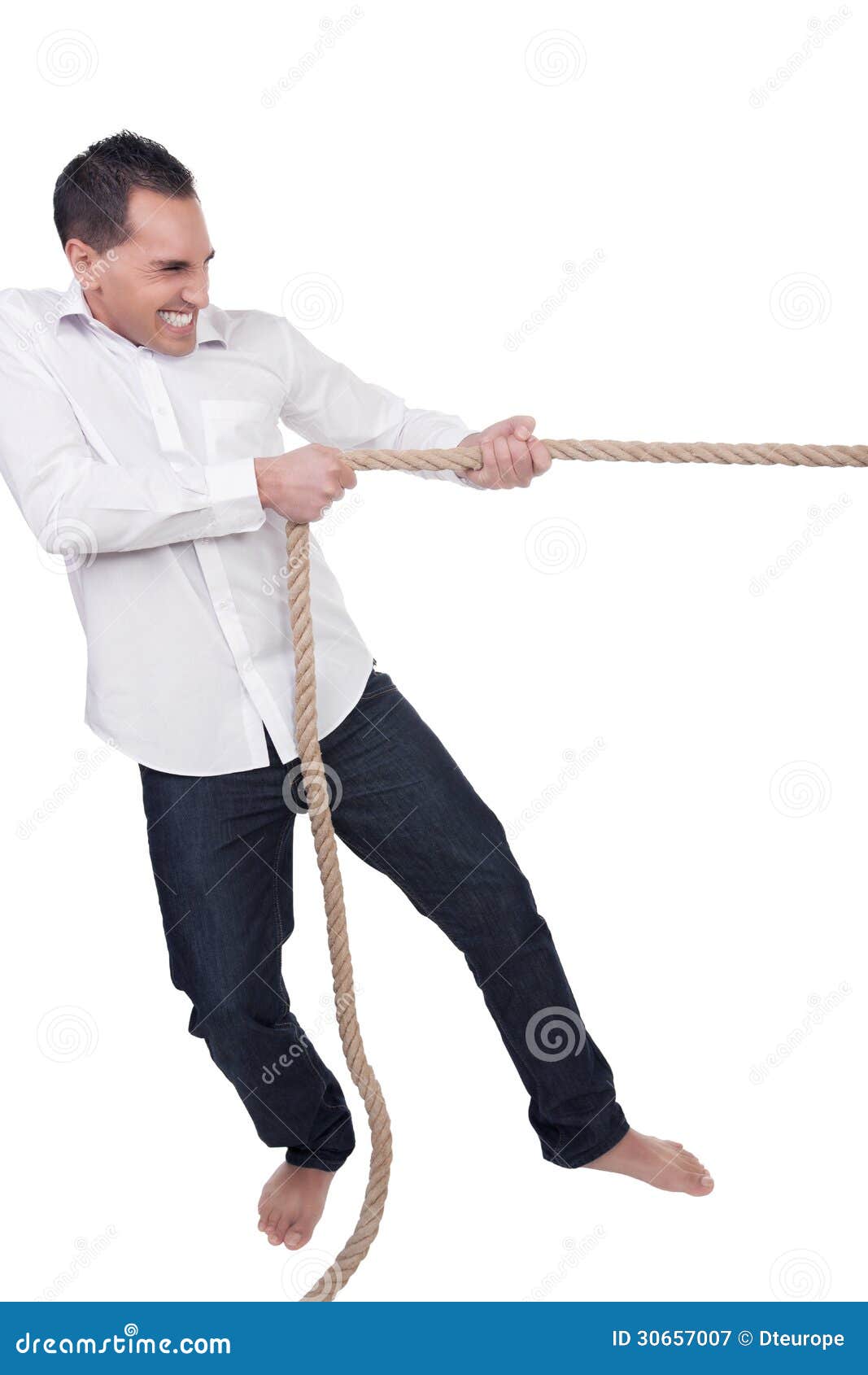 Man pulling on a rope stock image. Image of contest, rope - 30657007