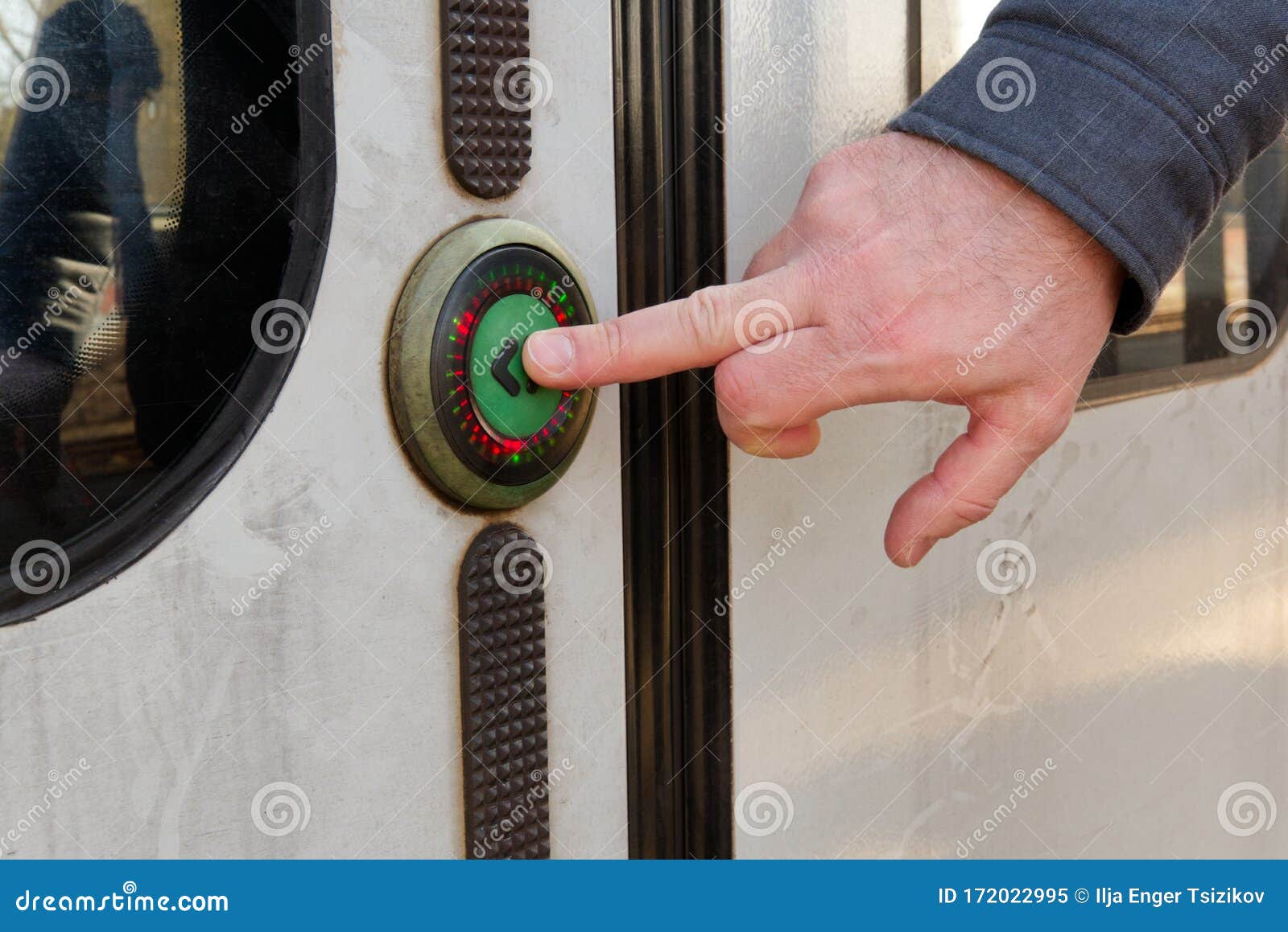 Man Pushing a Button To Open the Train Doors. Close Up Shoot Stock