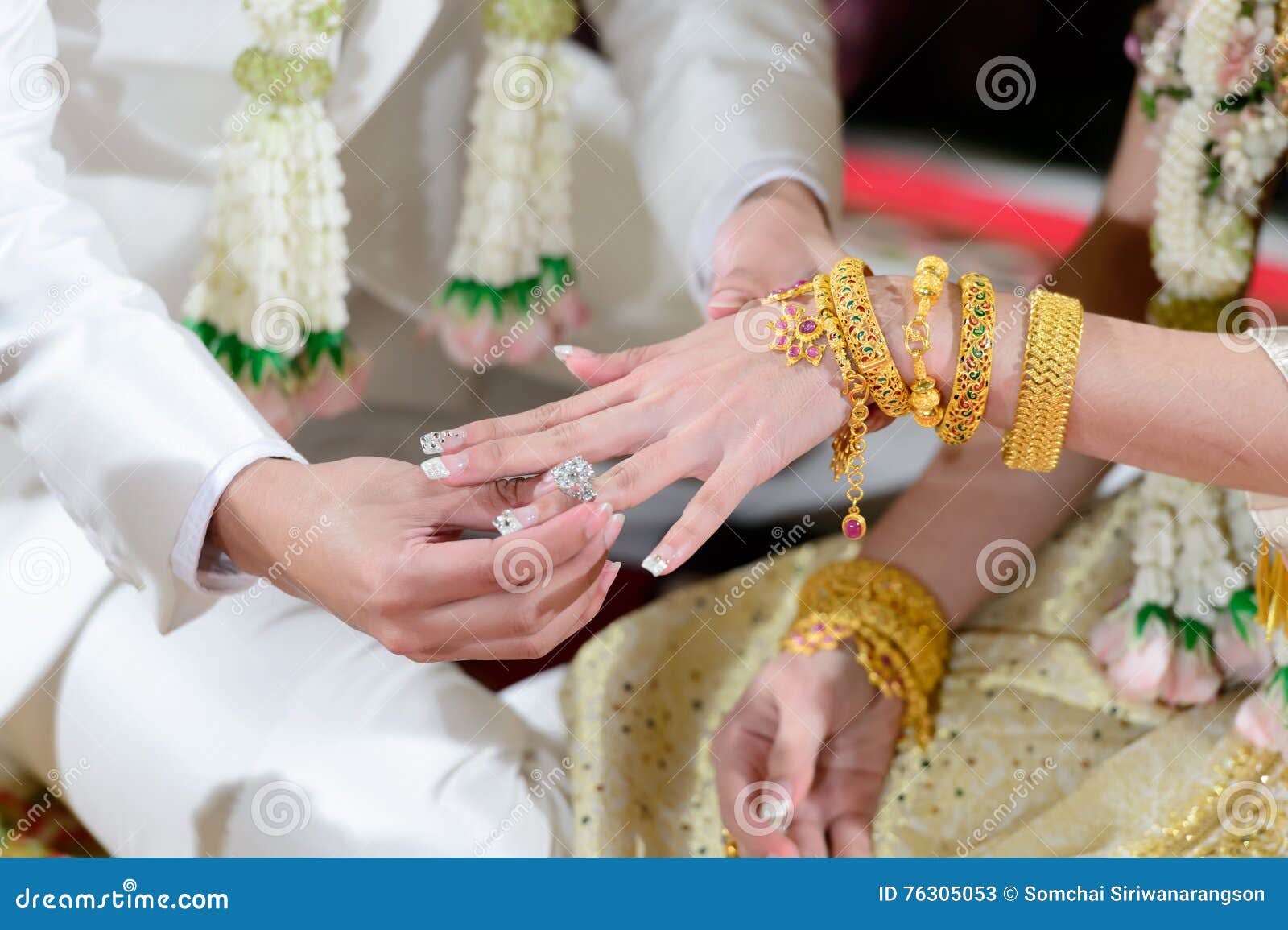 A Man Put on an Engagement Ring on the Finger of the Bride Stock Image