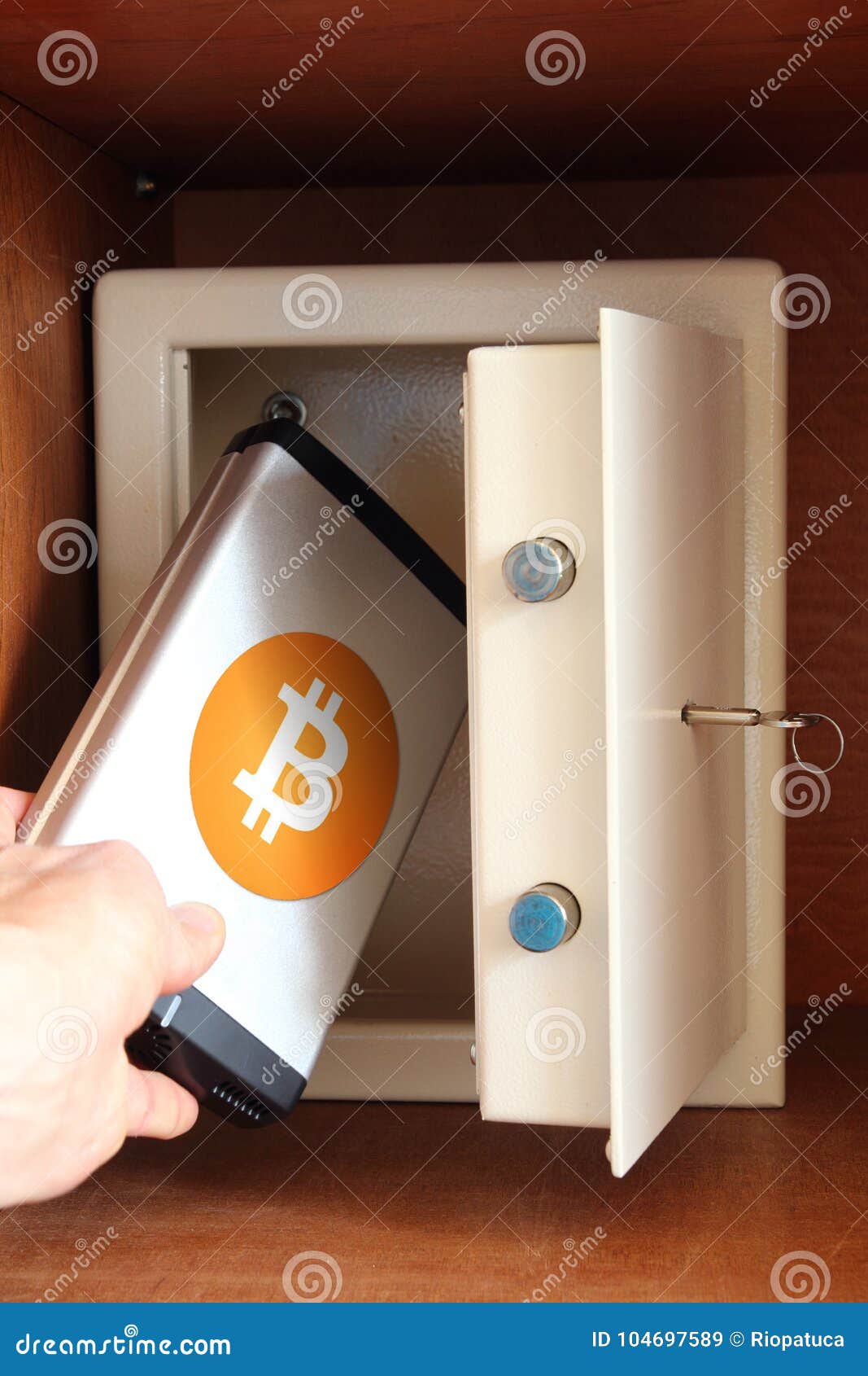 Man Puts External Hard Drive with Bitcoin in Safe Stock Image Image of money, computer 104697589