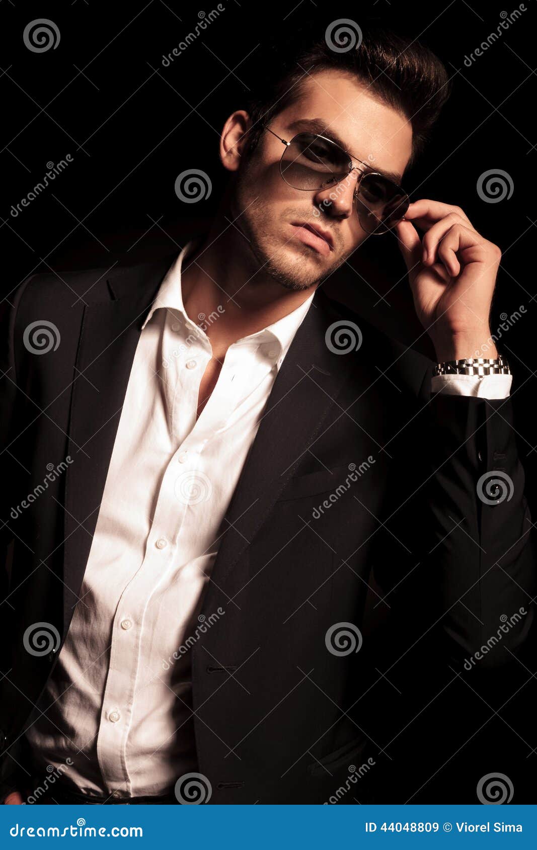 Man Puts On His Sunglasses And Looks To Side Stock Image Image of