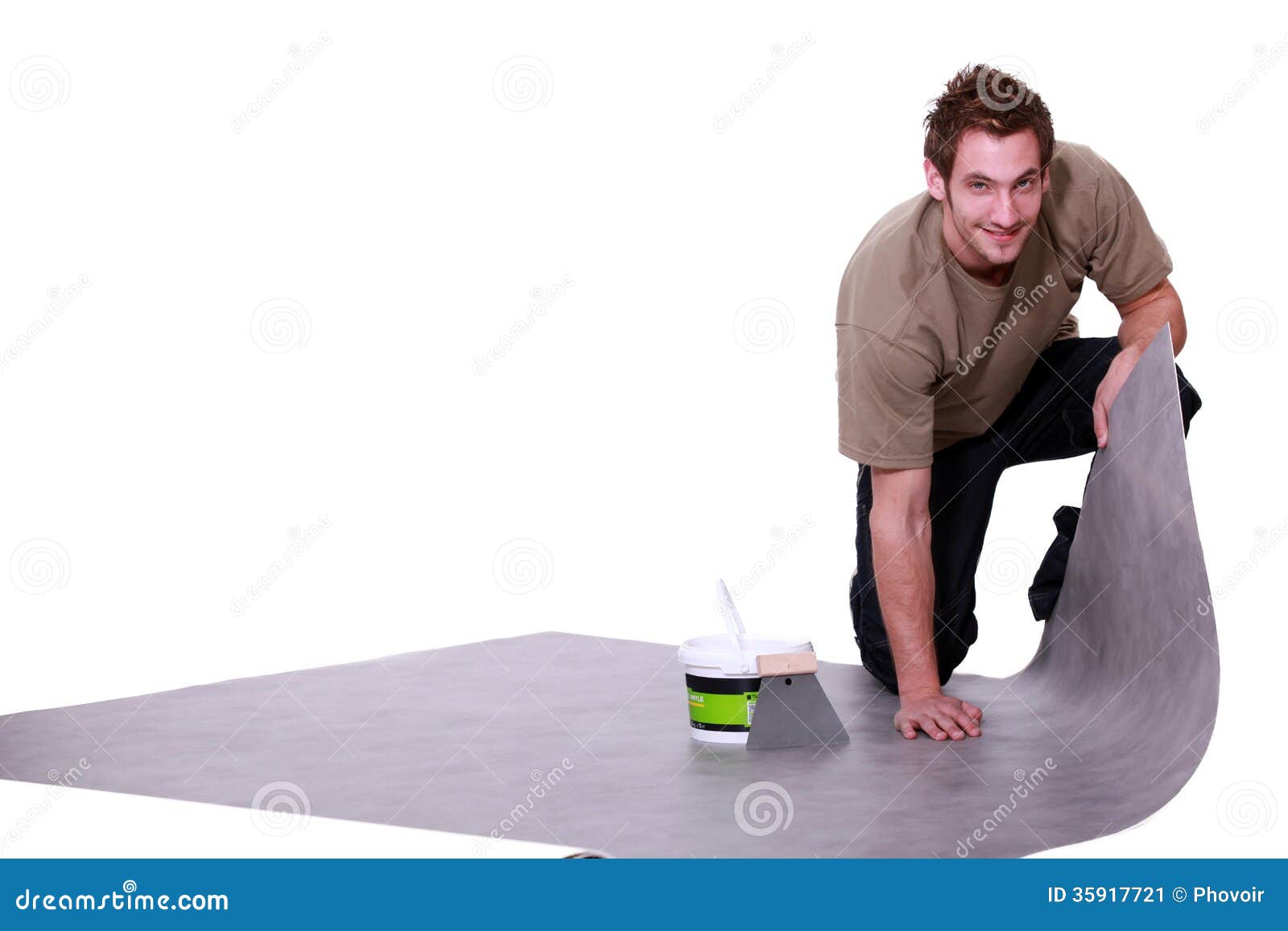 Man putting down flooring stock image. Image of improvement 35917721