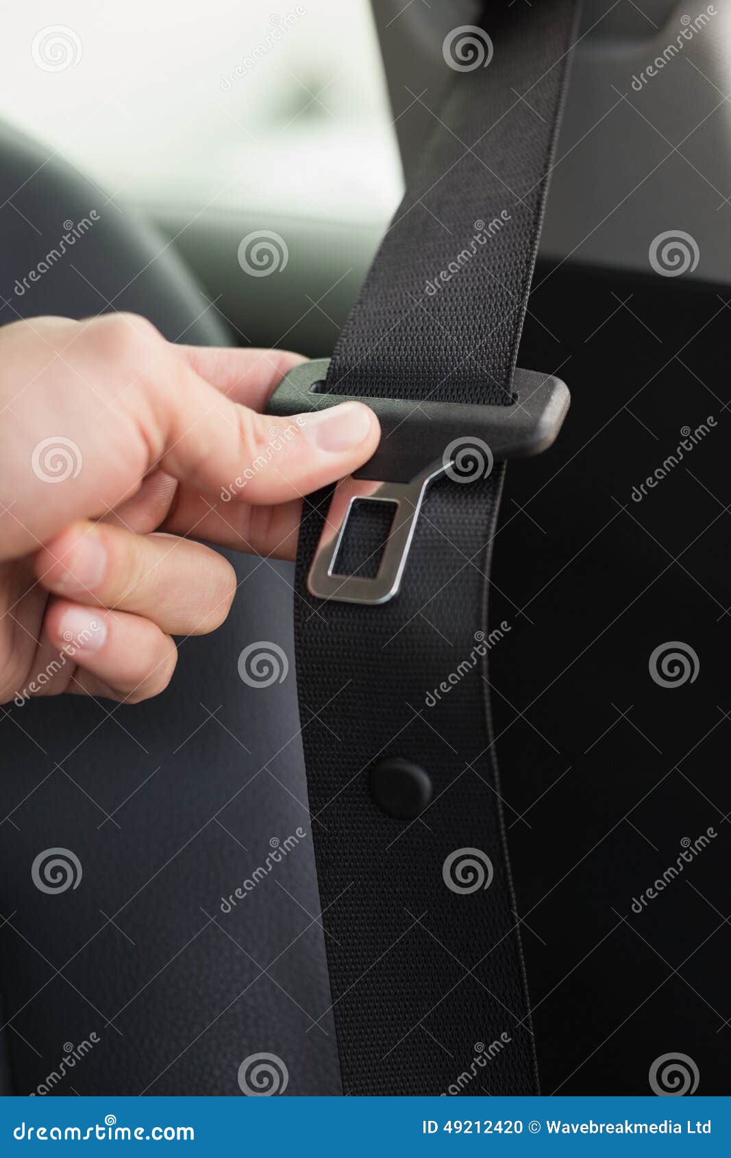Man Putting on His Seat Belt Stock Photo Image of transport, sitting