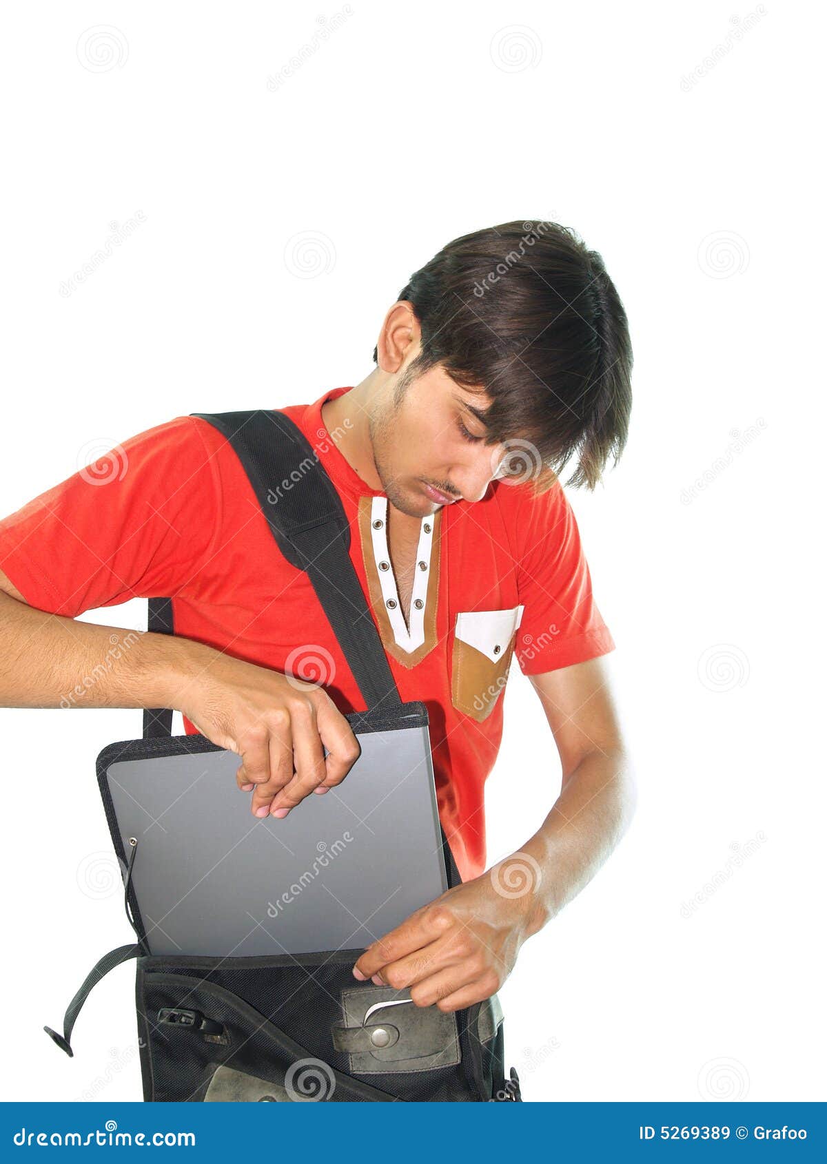 Man Putting Notebook In Bag Royalty Free Stock Images Image 5269389