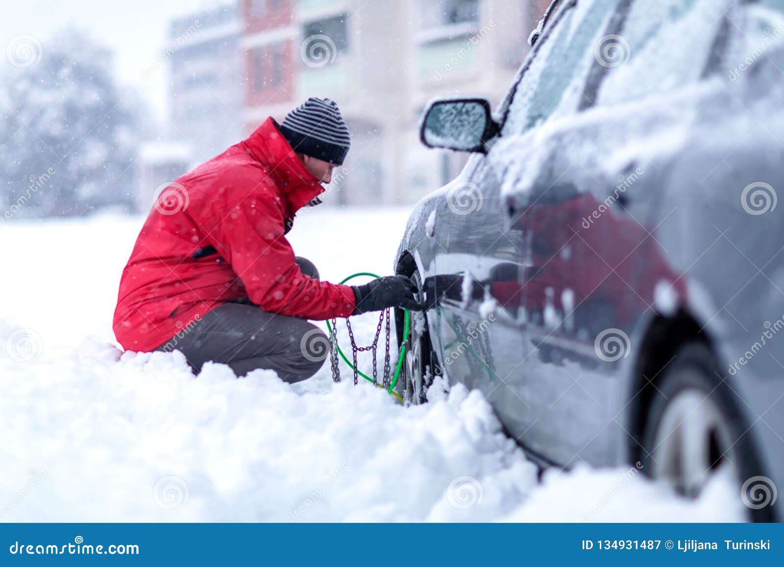 Man Putting Snow Chains on Car Tire Stock Image Image of cold, hand