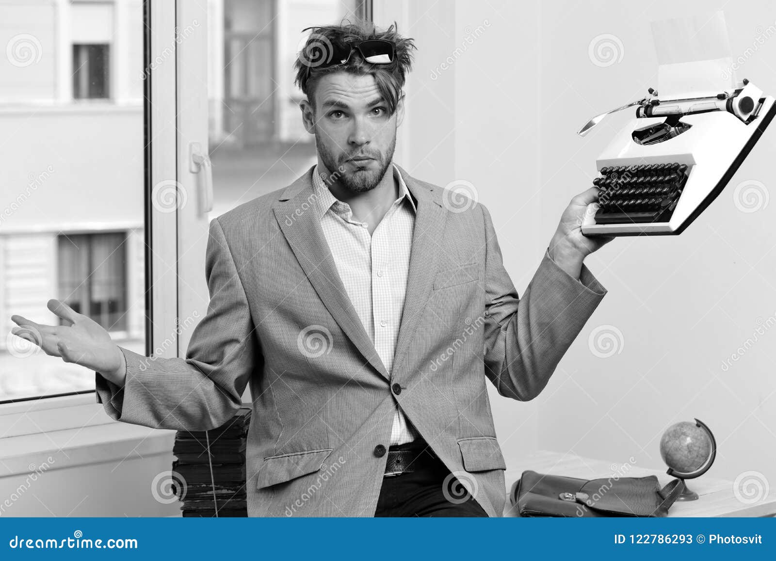 Man with Puzzled Face Types Business Report. Young Author or Editor Holds  Old Typewriter on Window Background Stock Image - Image of editing,  puzzled: 122786293