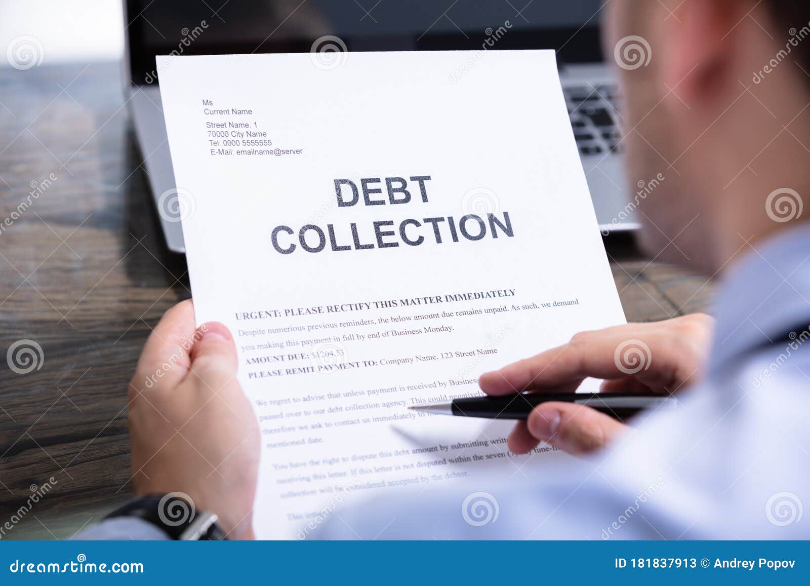 man reading debt collection letter