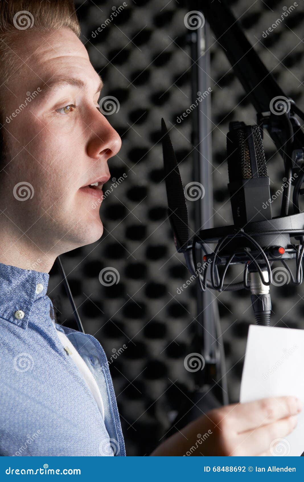 Man in Recording Studio Talking into Microphone Stock Photo Image of