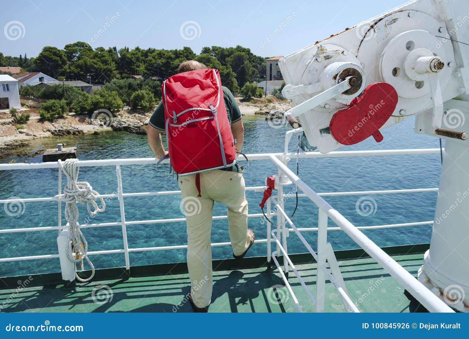 Man with red backpack. editorial photo. Image of travel 100845926