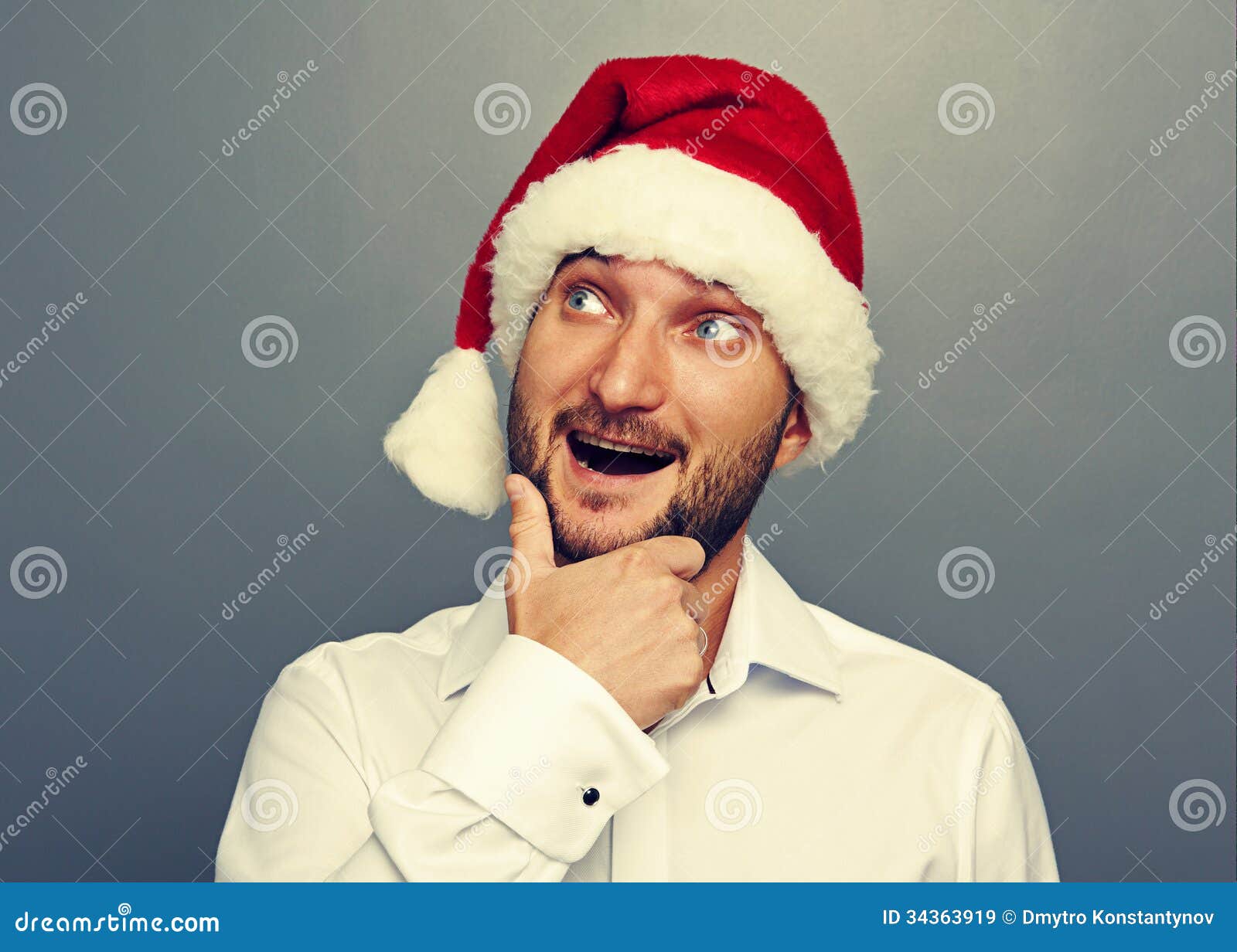 Man in red hat looking up stock image. Image of laugh 34363919