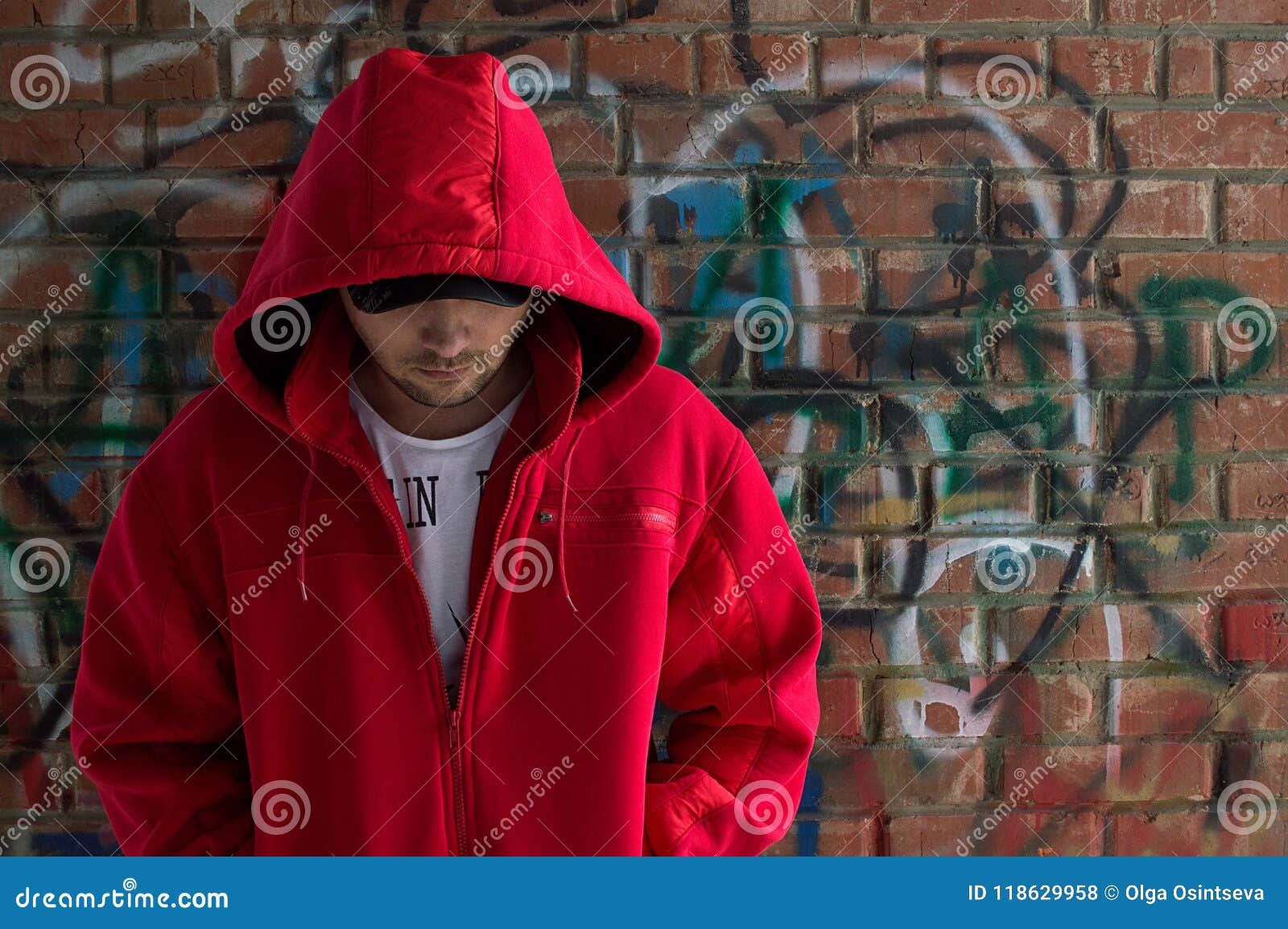 A Man in a Red Jacket on the Street Stock Photo Image of sweatshirt lips 118629958