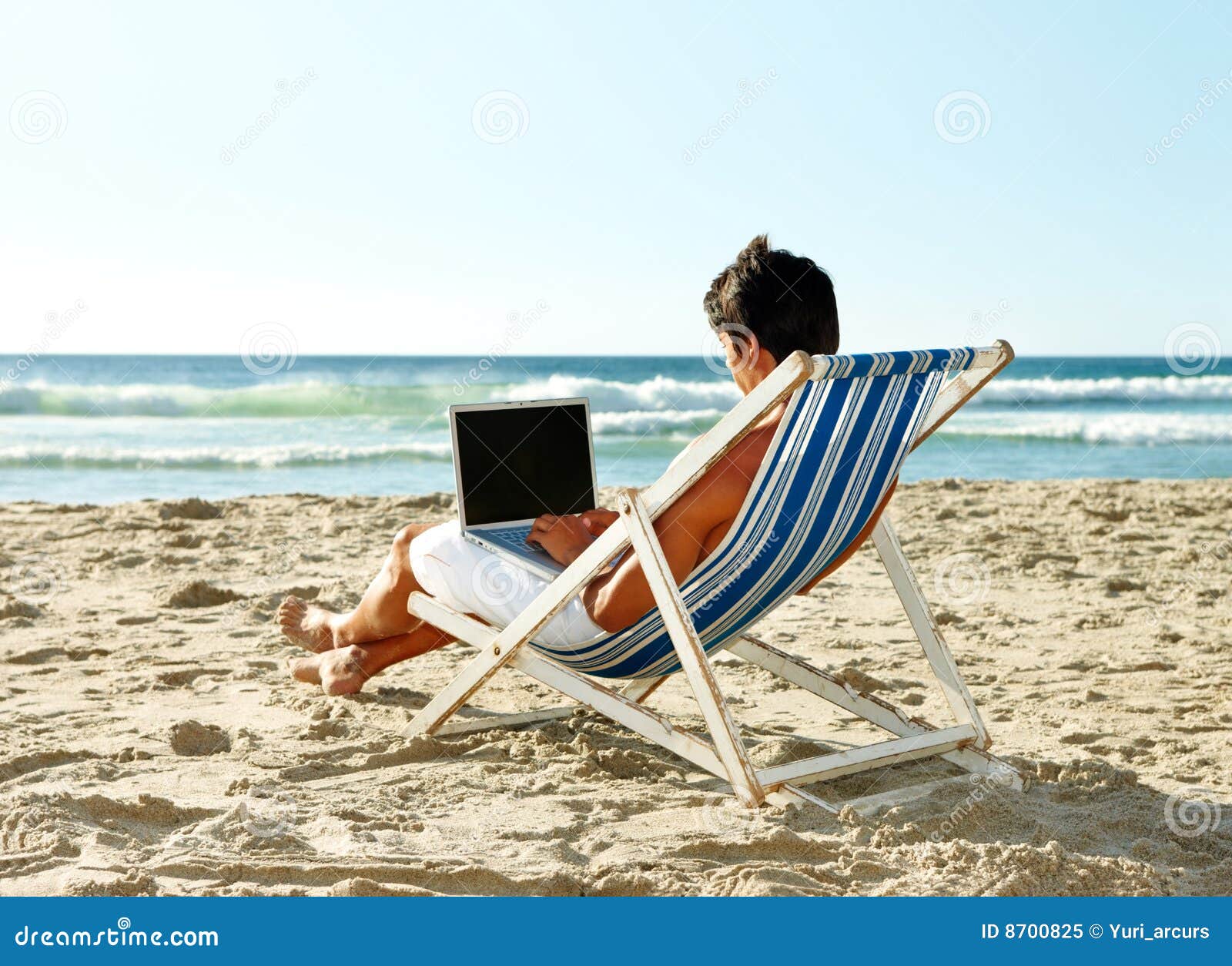 Man Relaxing on Deck Chair and Working on Laptop Stock Image - Image of ...