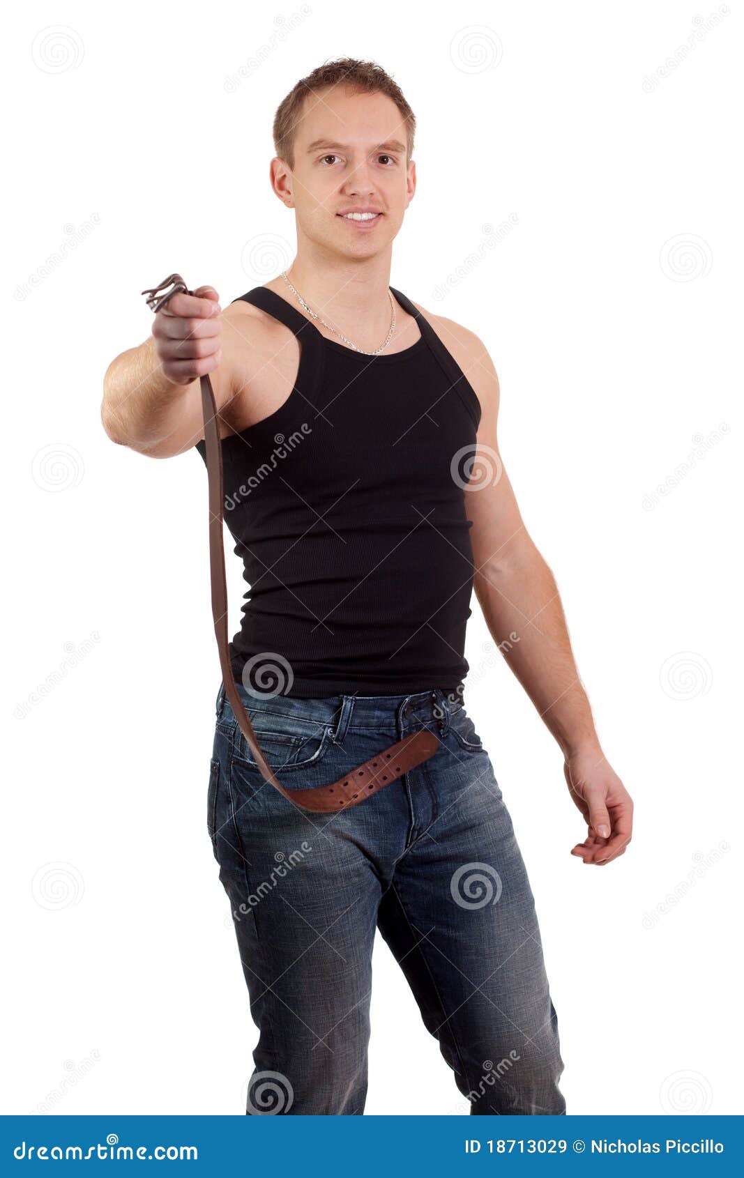 Man Removing Belt stock image. Image of model, adult 18713029
