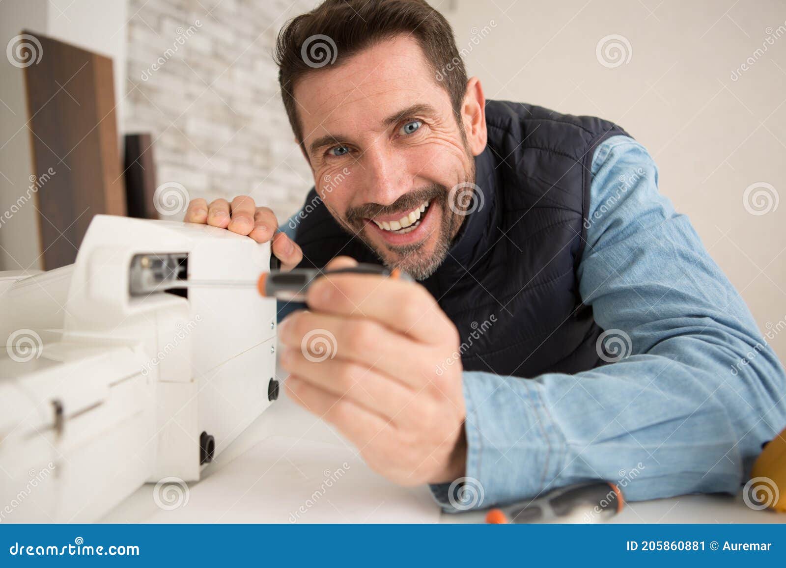 Man Repairer Fixing Sewing Machine Stock Image Image of mechanic