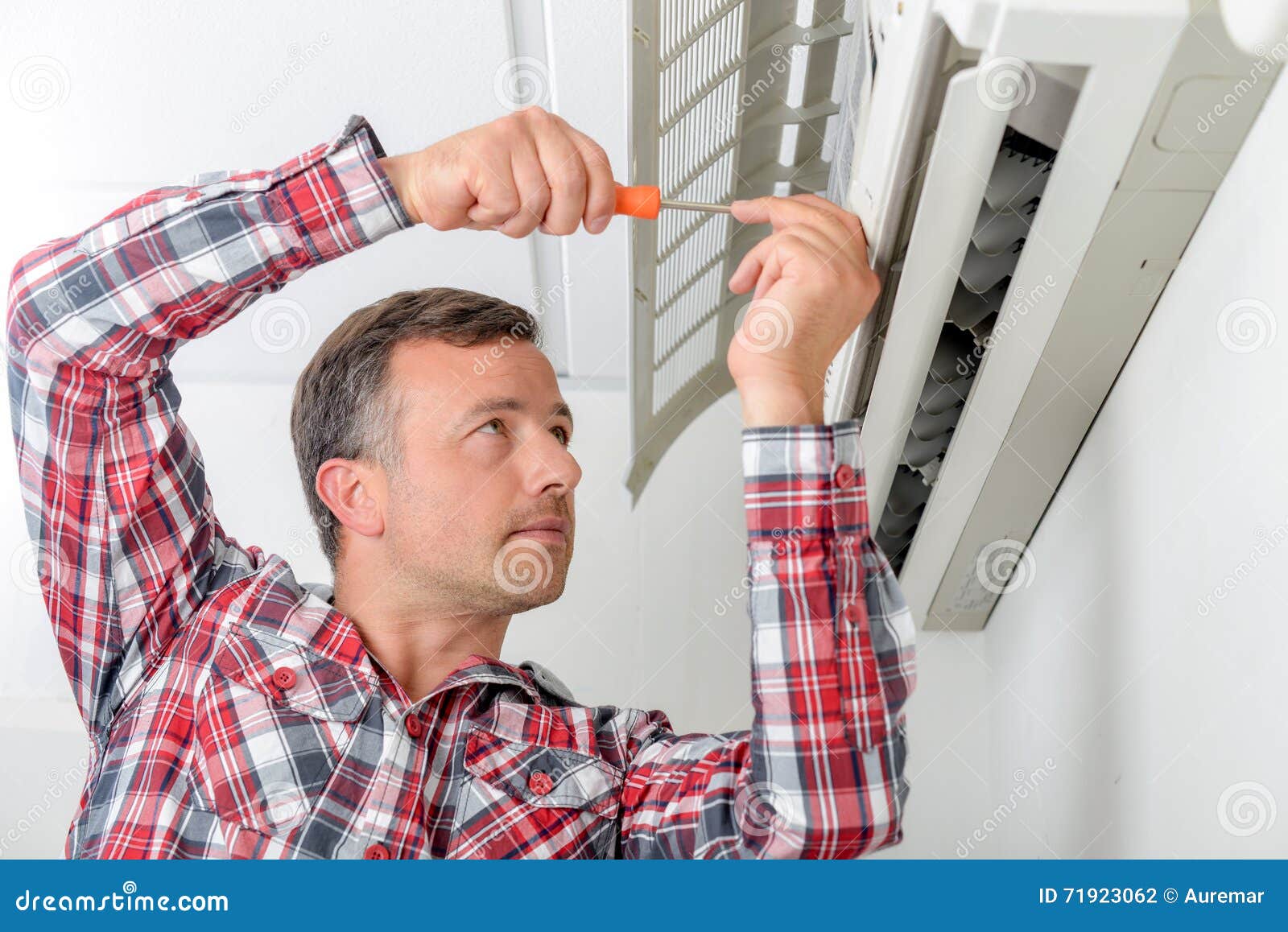 Man Repairing His Air Conditioning System Stock Photo Image of home, blowing 71923062