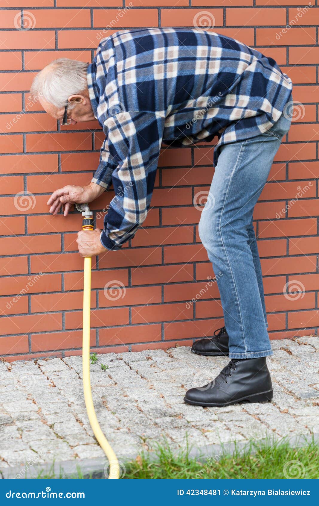Download Man Repairing Leaky Garden Hose Spigot Stock Image - Image ...