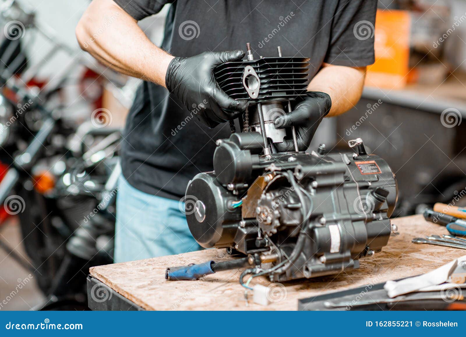 Man Repairing Motorcycle Engine Stock Image Image of manual, auto 162855221