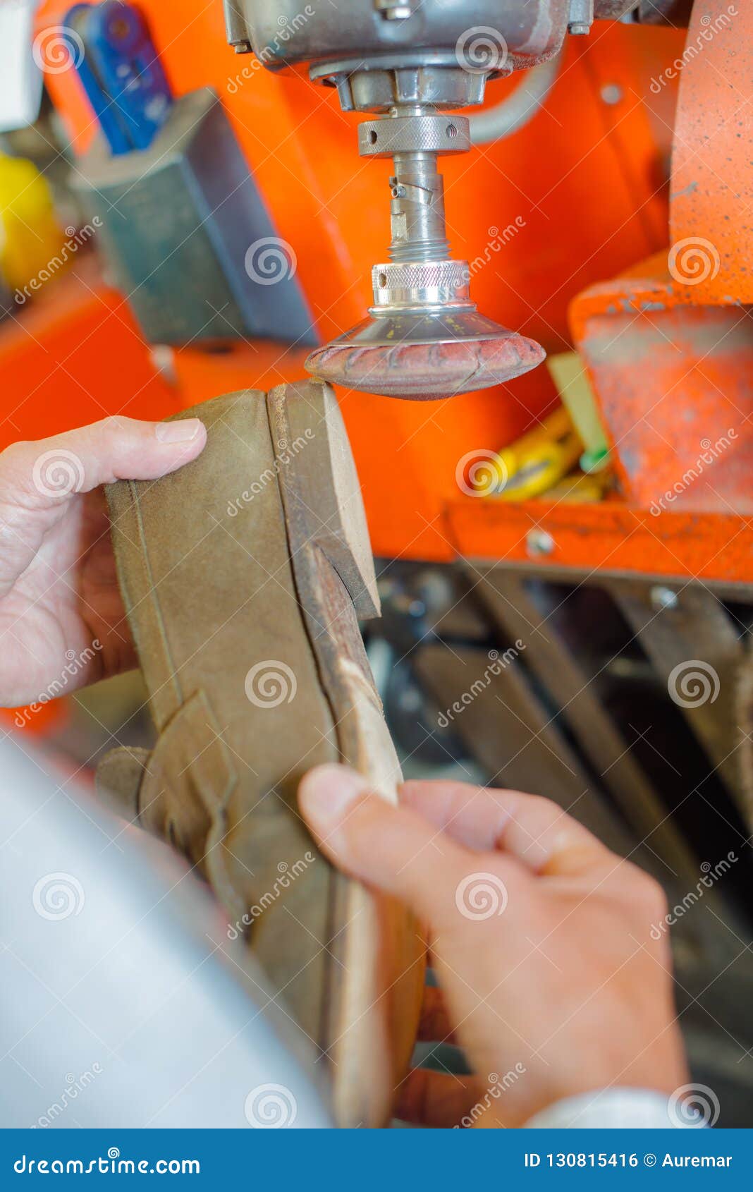 Man repairing a shoe stock photo. Image of service, gadget 130815416