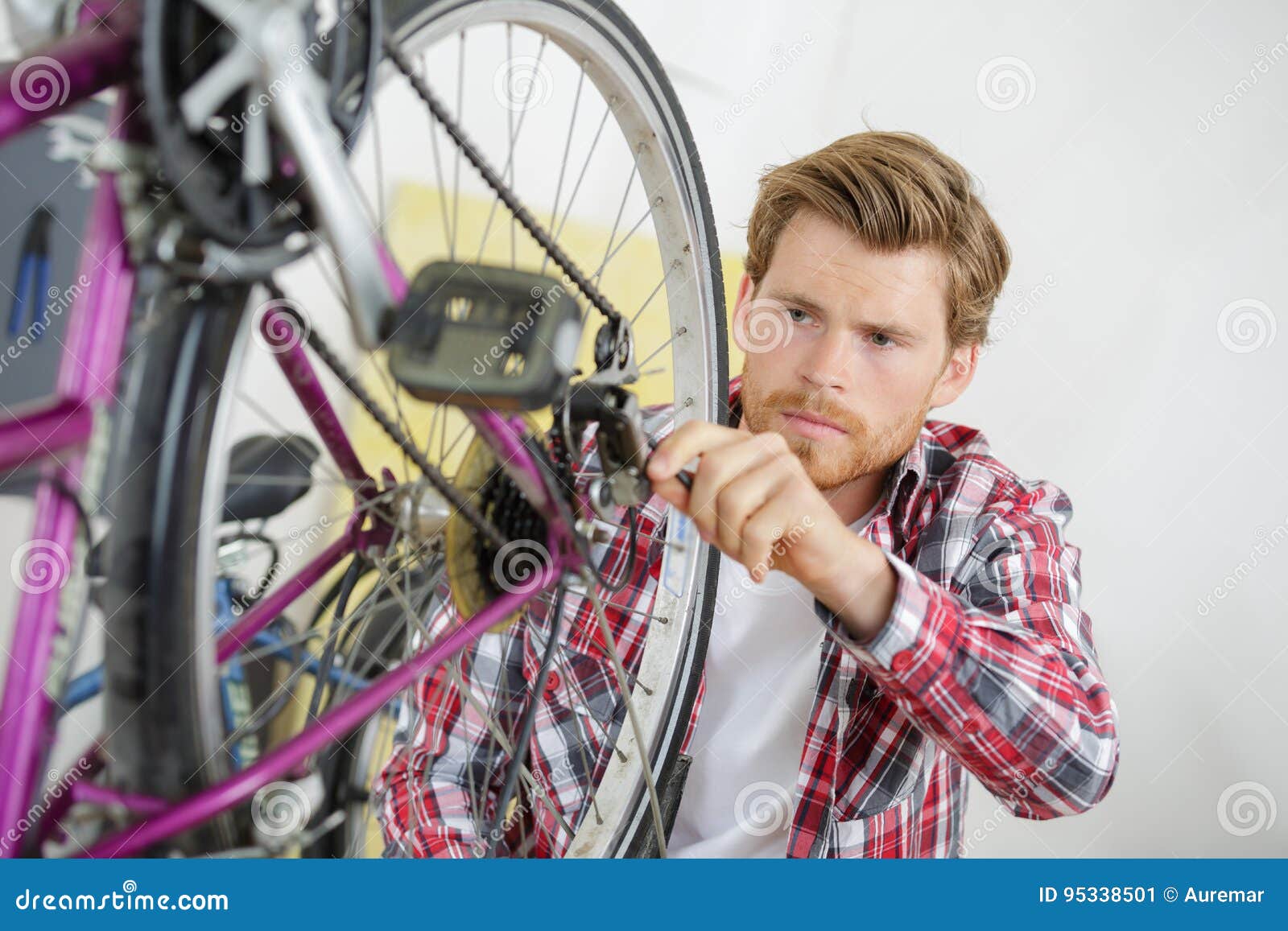 Man repairs wheel bicycle stock image. Image of chain 95338501