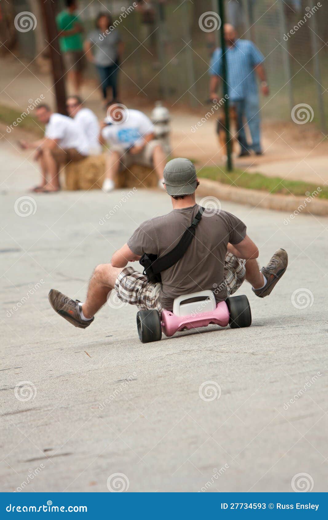 Man Rides Big Wheel Down Hill Editorial Stock Photo Image of daring
