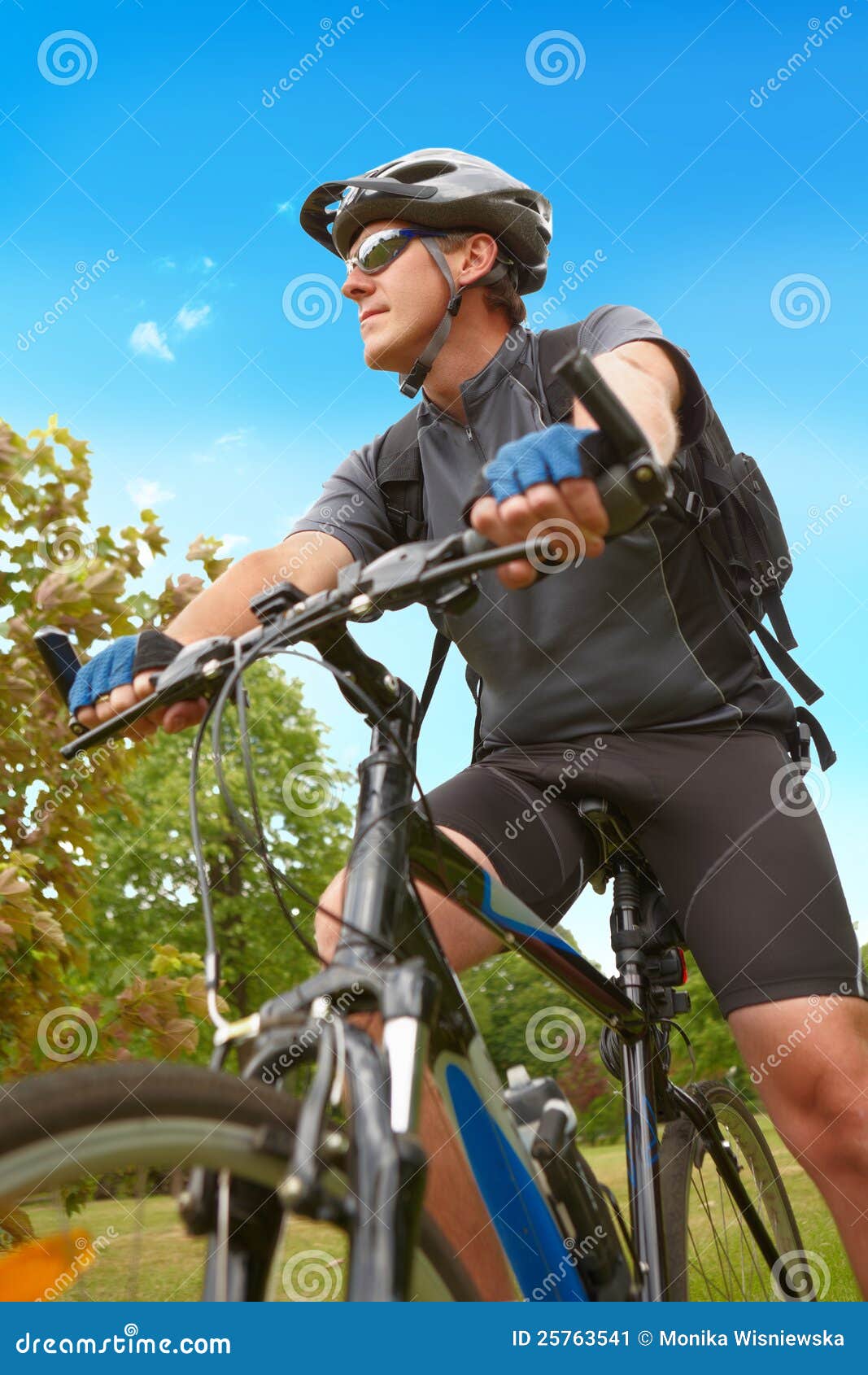 Man Riding Bike Stock Image - Image: 25763541