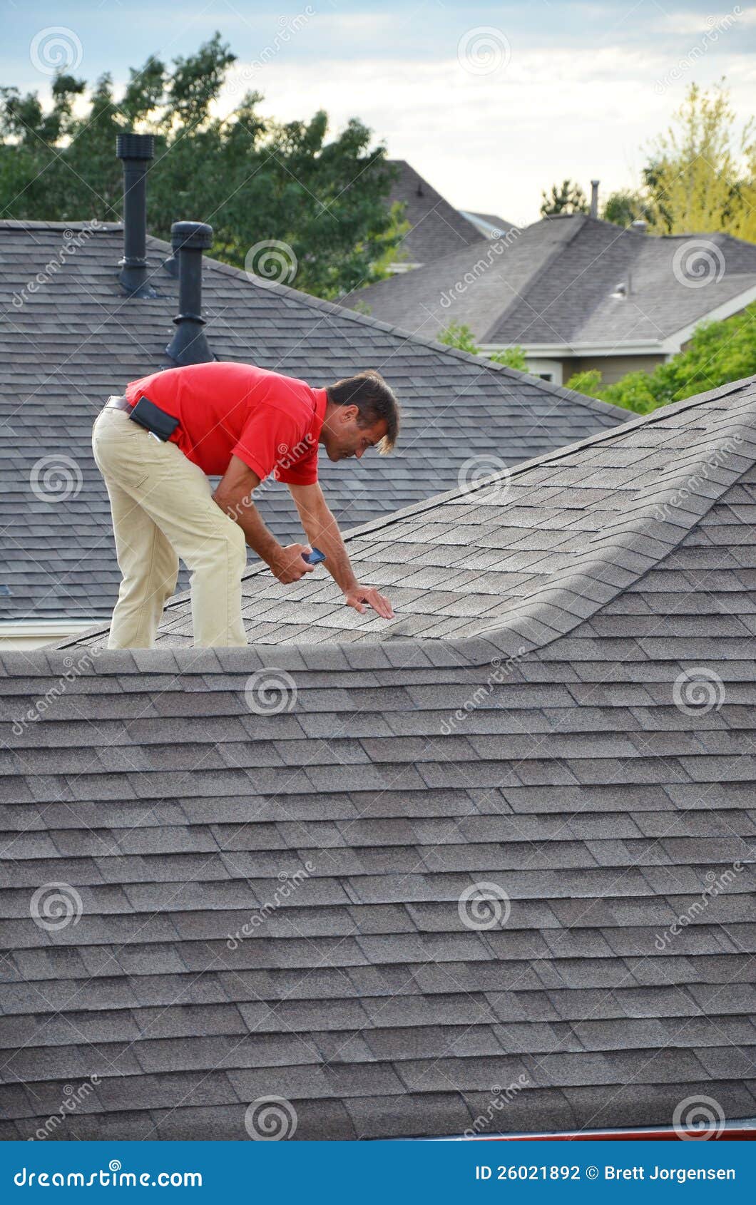 a man on a roof