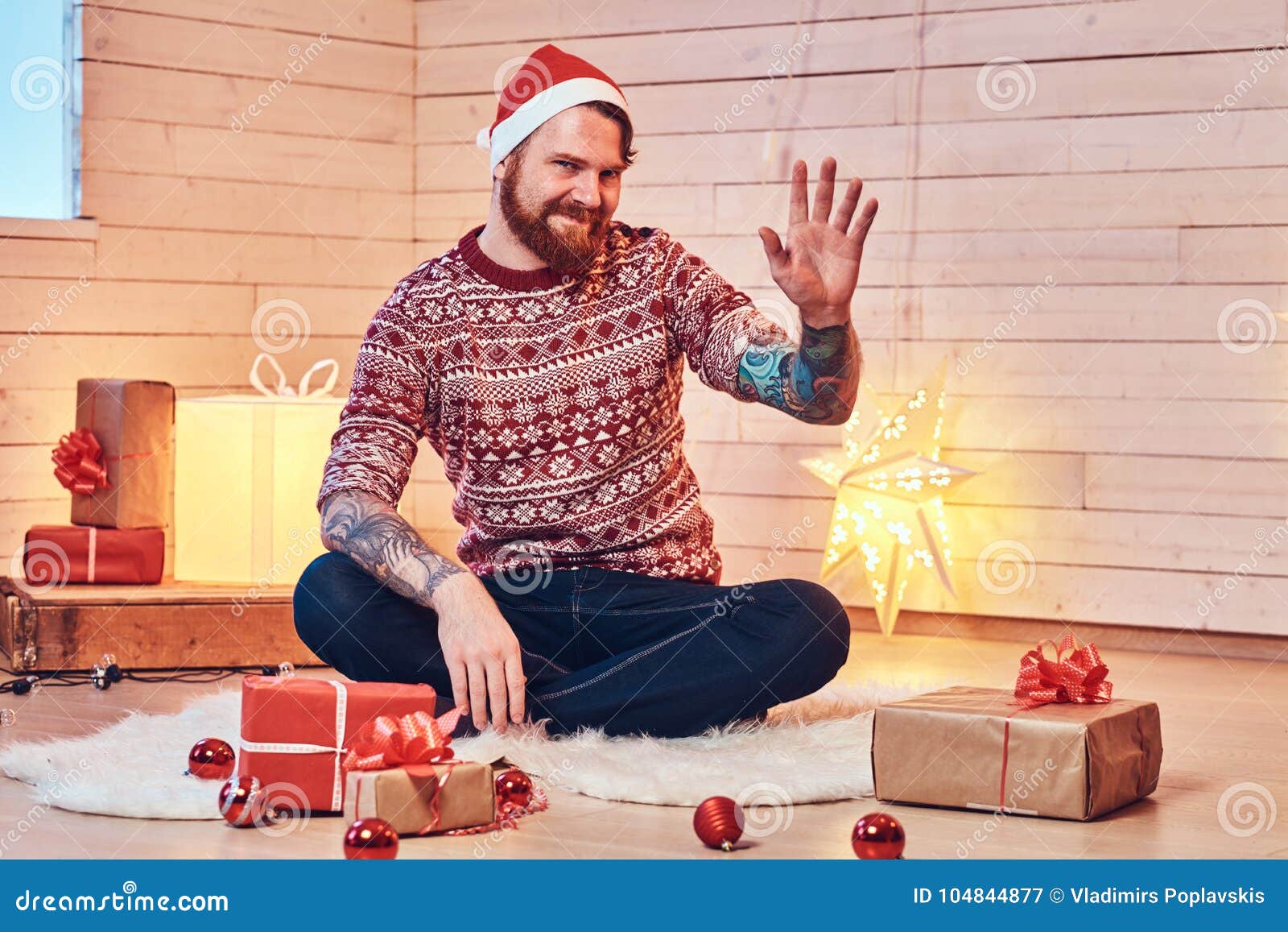 A Man In A Room With Christmas Decoration. Stock Image - Image of