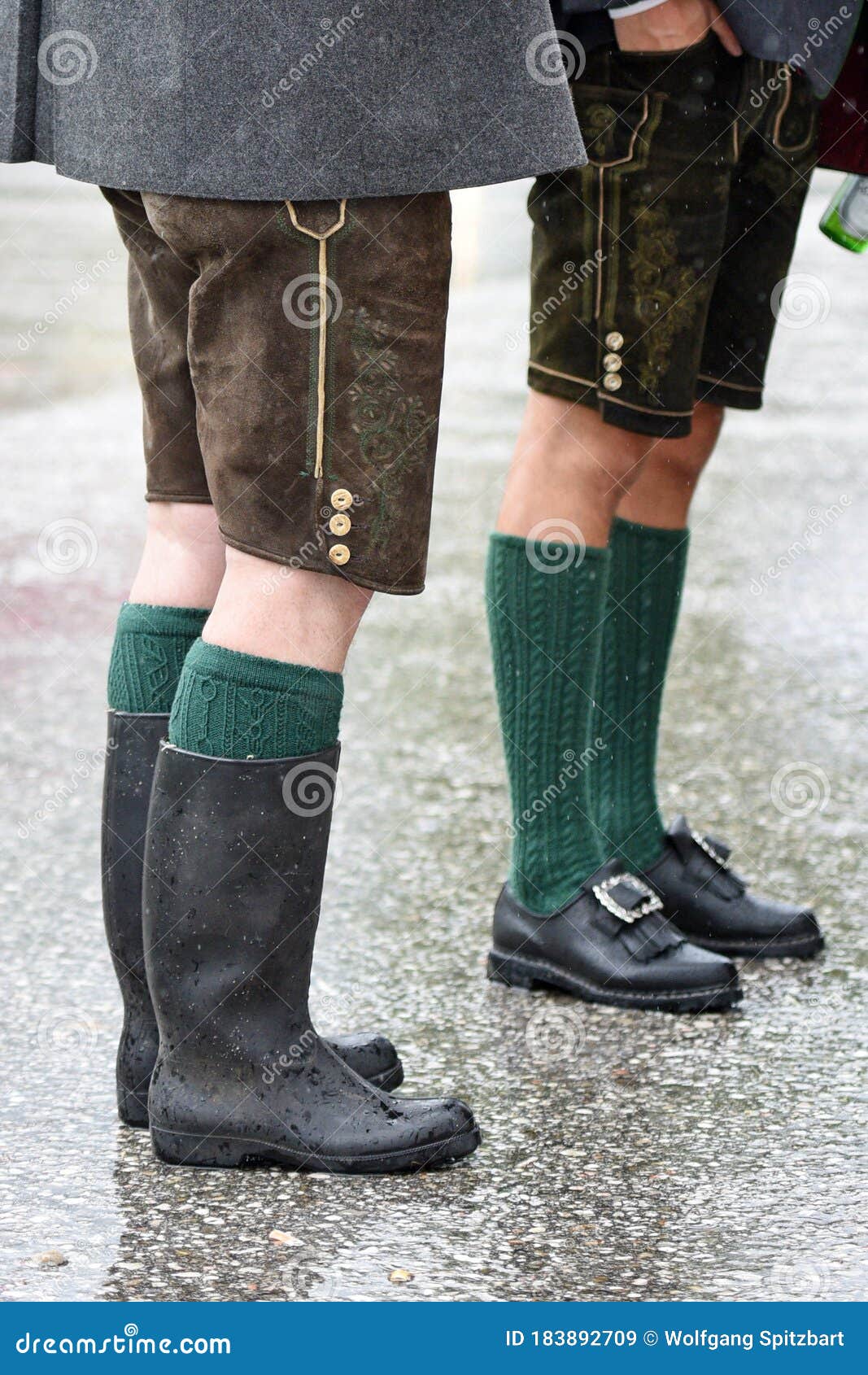 A Man With Rubber Boots In The Rain 