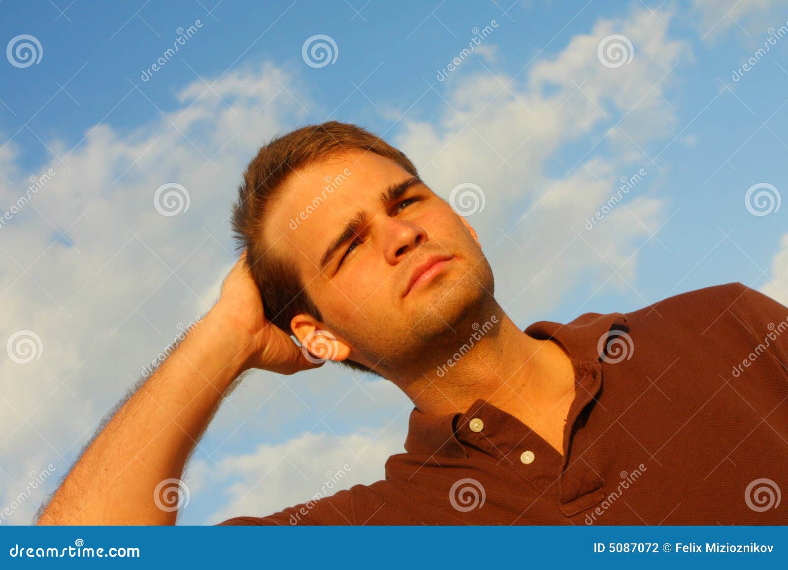 Man rubbing his Hair stock photo. Image of shot, portrait 5087072