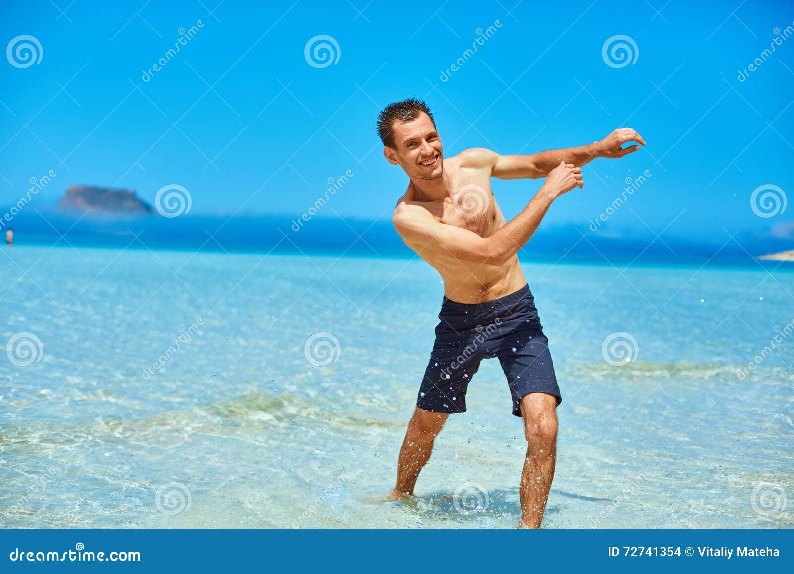 Man running on the beach stock photo. Image of active - 72741354