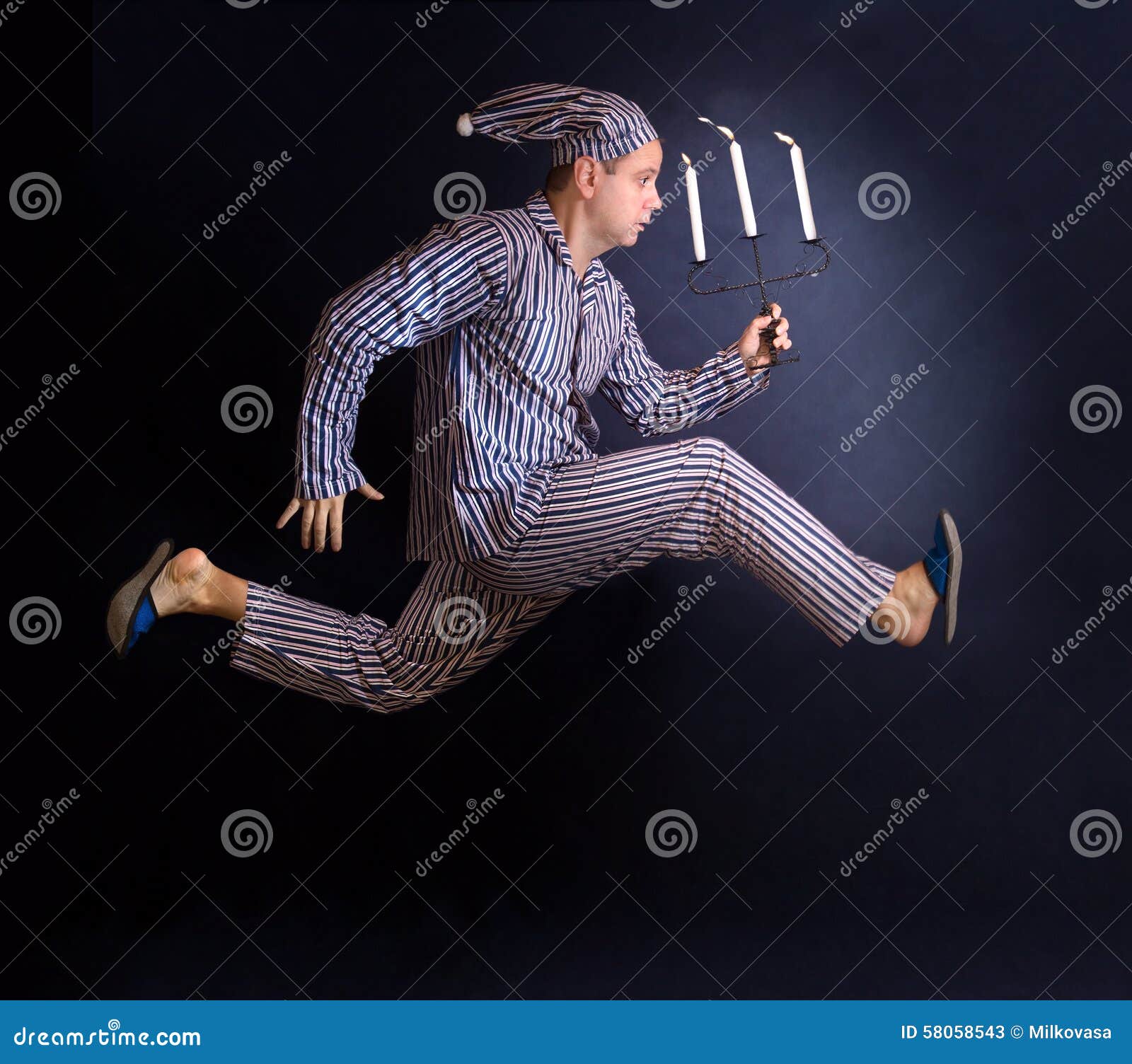 Man Running with a Candlestick Stock Image - Image of black, concept ...