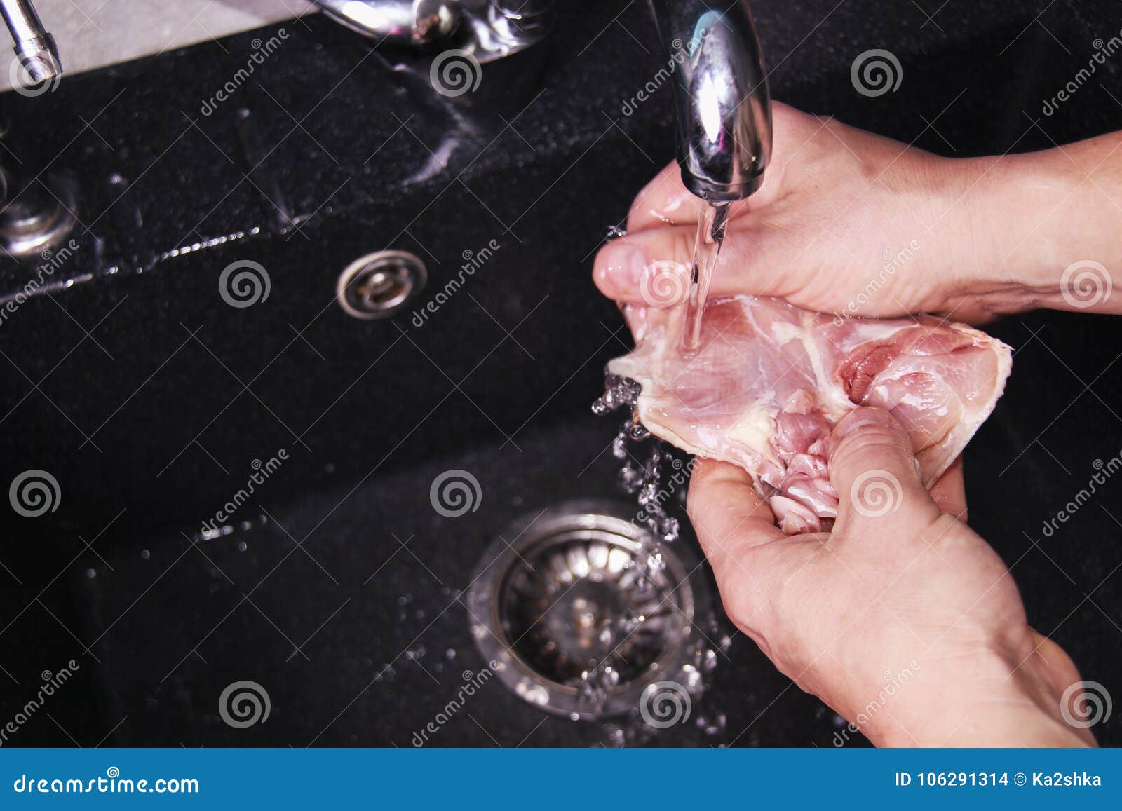 Man S Hands Washing And Cleaning Chicken Wings At The