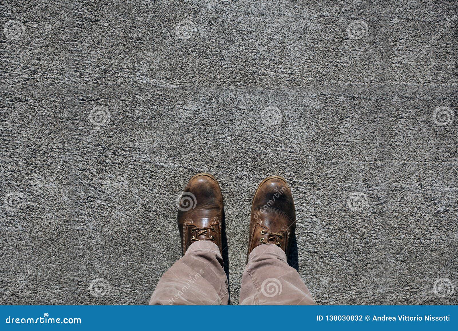 Man`s Shoes View from Above on Concrete Pavement with Large Copy Space ...