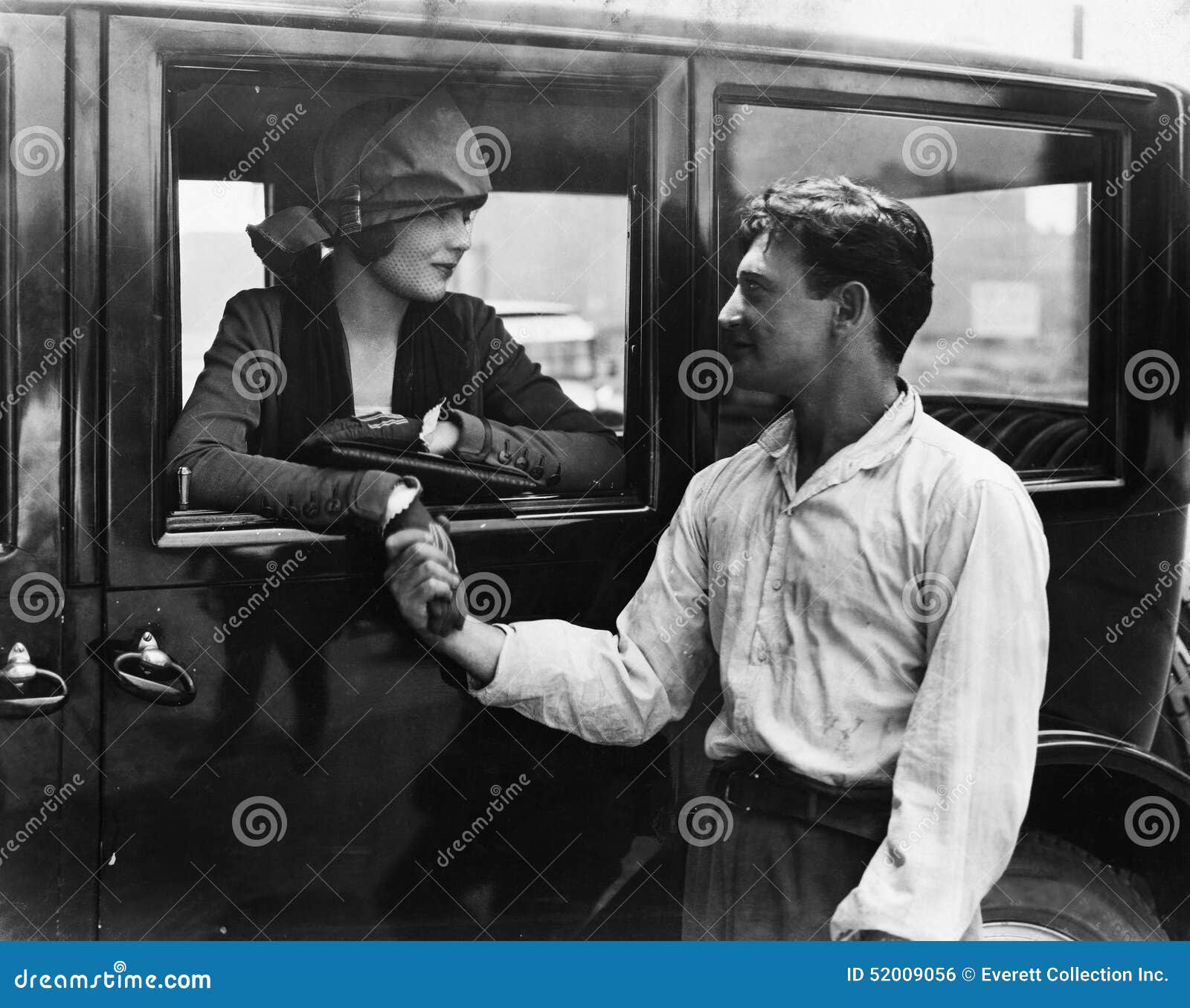 Man Saying Goodbye To Woman In Car Stock Photo - Image: 520090561300 x 1118