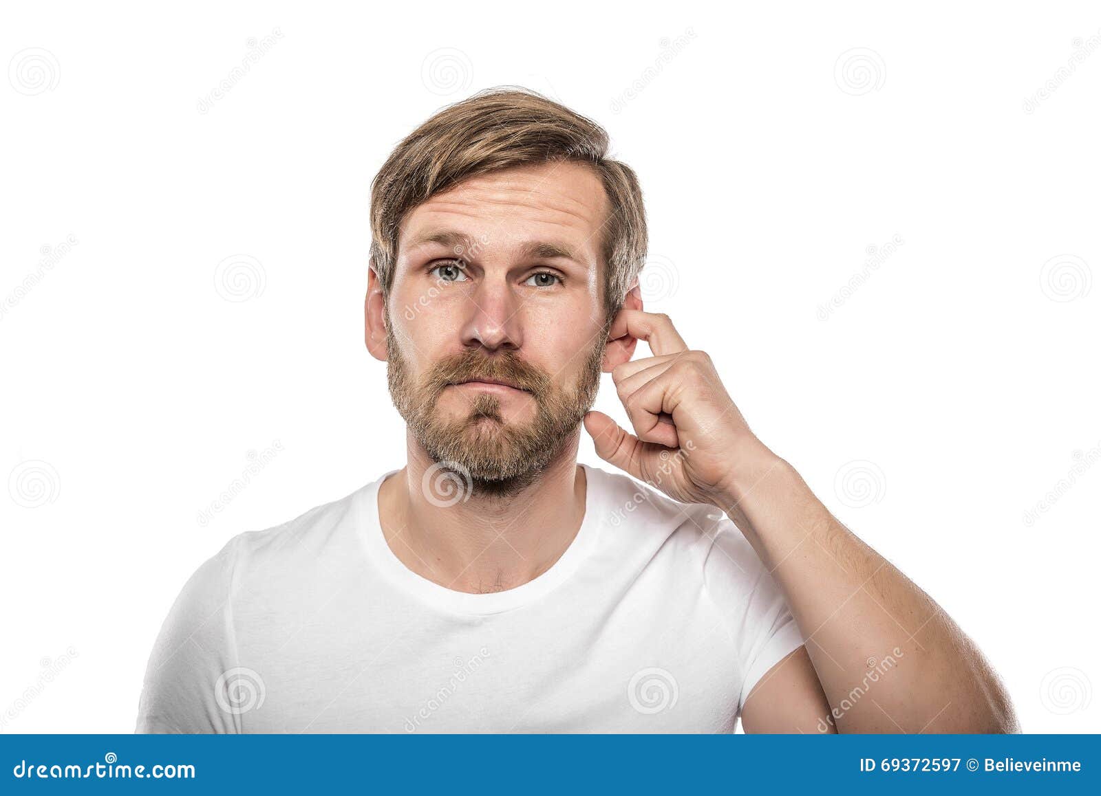 Man Scratching in His Ear. stock image. Image of clogged 69372597