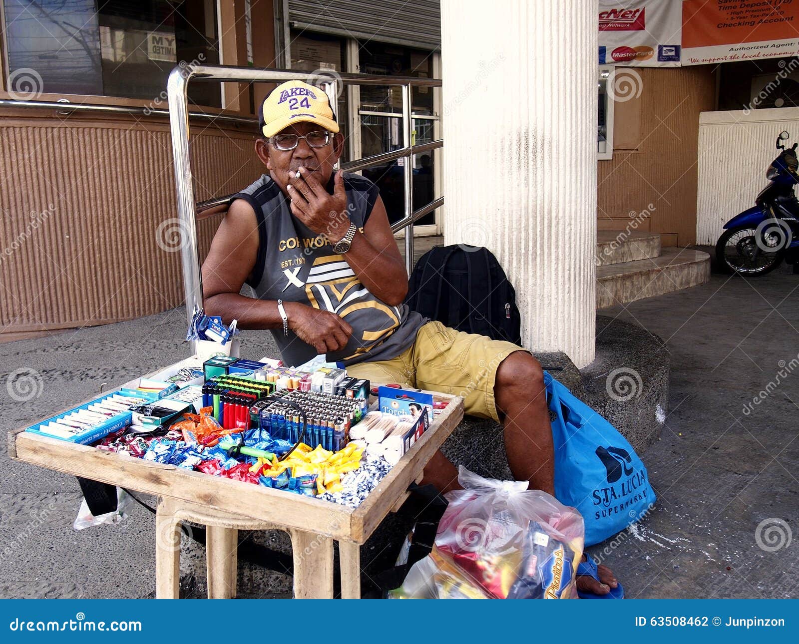 A Man Sells Candies Cigarettes And Lighters At A Sidewalk Editorial Photography Image Of Business Road A Man Sells Candies Cigarettes And Lighters At A Sidewalk Editorial Photography Image Of Business Road