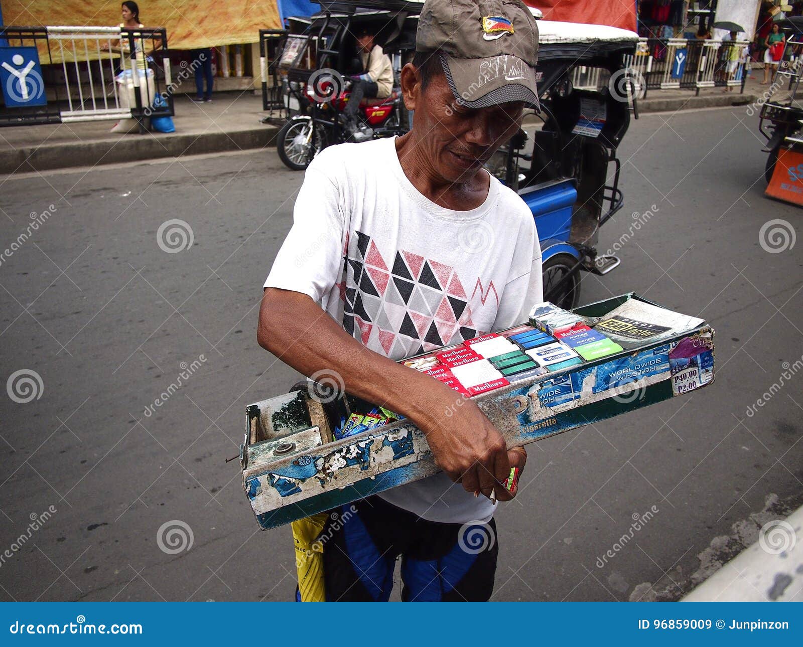 A Man Sells Cigarettes Candies And Snack Items Along A Street In Antipolo City Editorial Stock Image Image Of Road Philippines A Man Sells Cigarettes Candies And Snack Items Along A Street In Antipolo City Editorial Stock Image Image Of Road Philippines